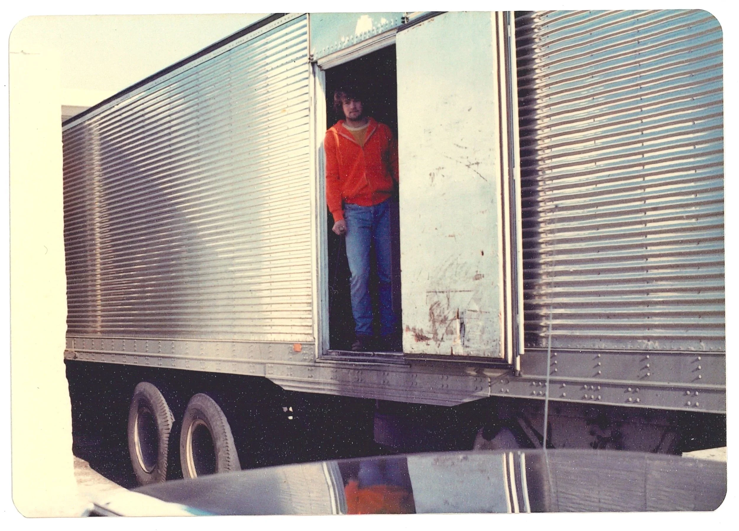 Man Standing In Truck, ca. 1975