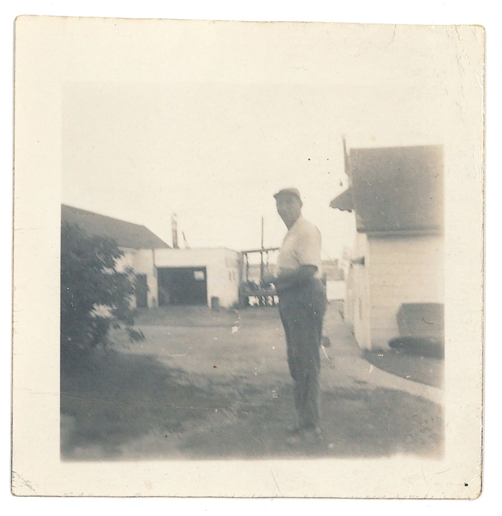 Unidentified Man Outside Pell's Fish Market, ca. 1950