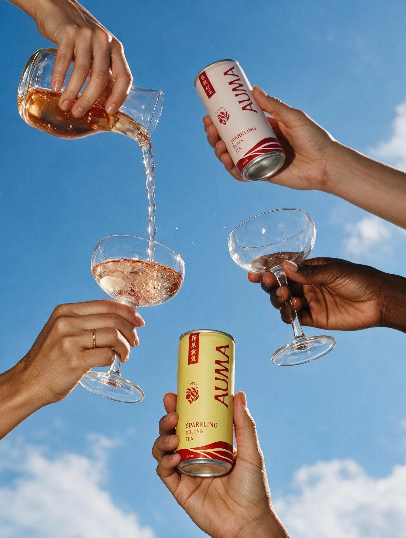 Auma Cans Pouring Hands.jpg