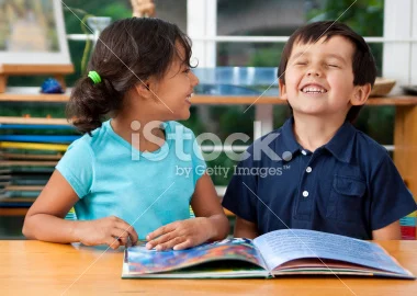 stock-photo-14574344-preschoolers-enjoying-a-book.jpg