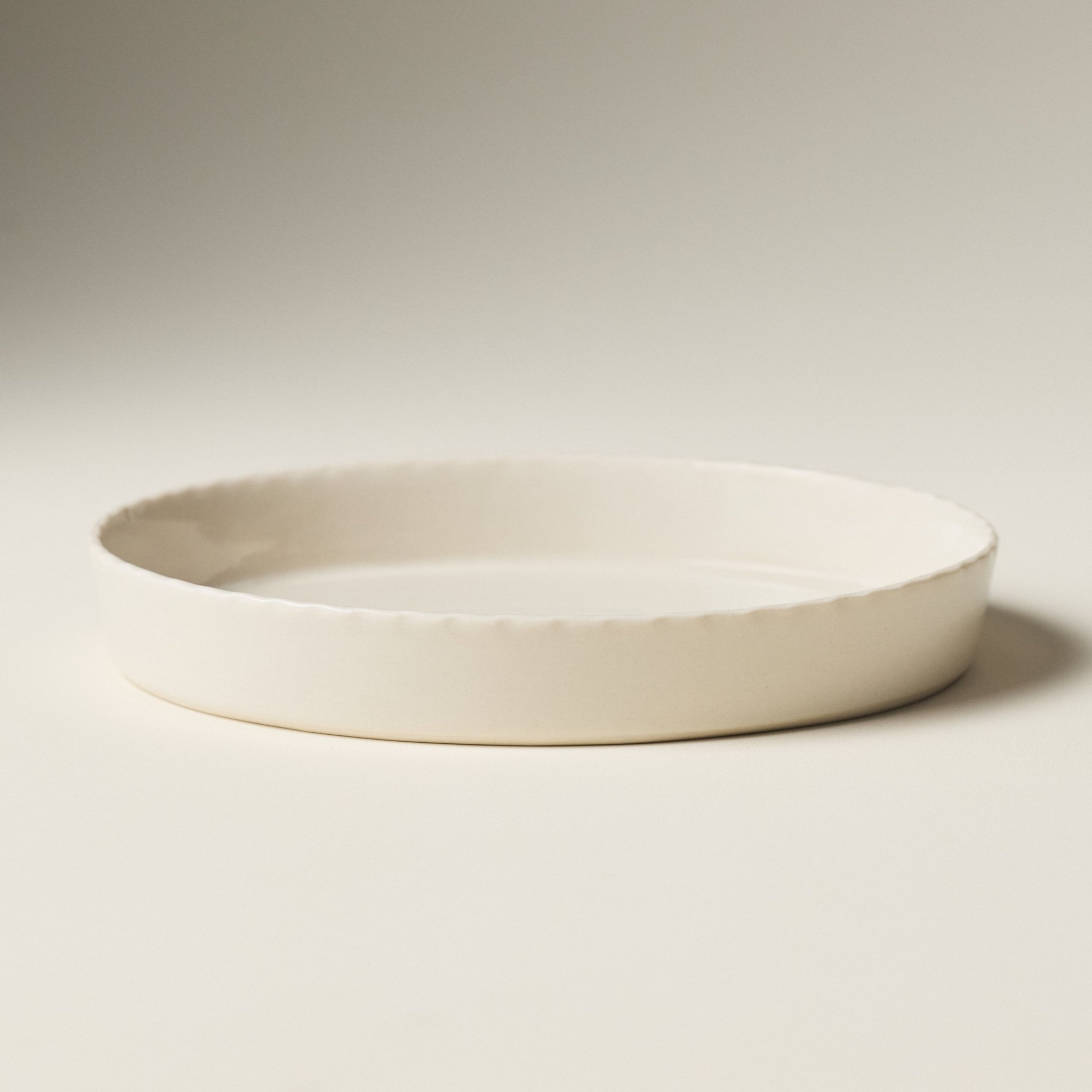 PetitFelts Natural ceramic platter with fluted edge, hand-glazed clear gloss