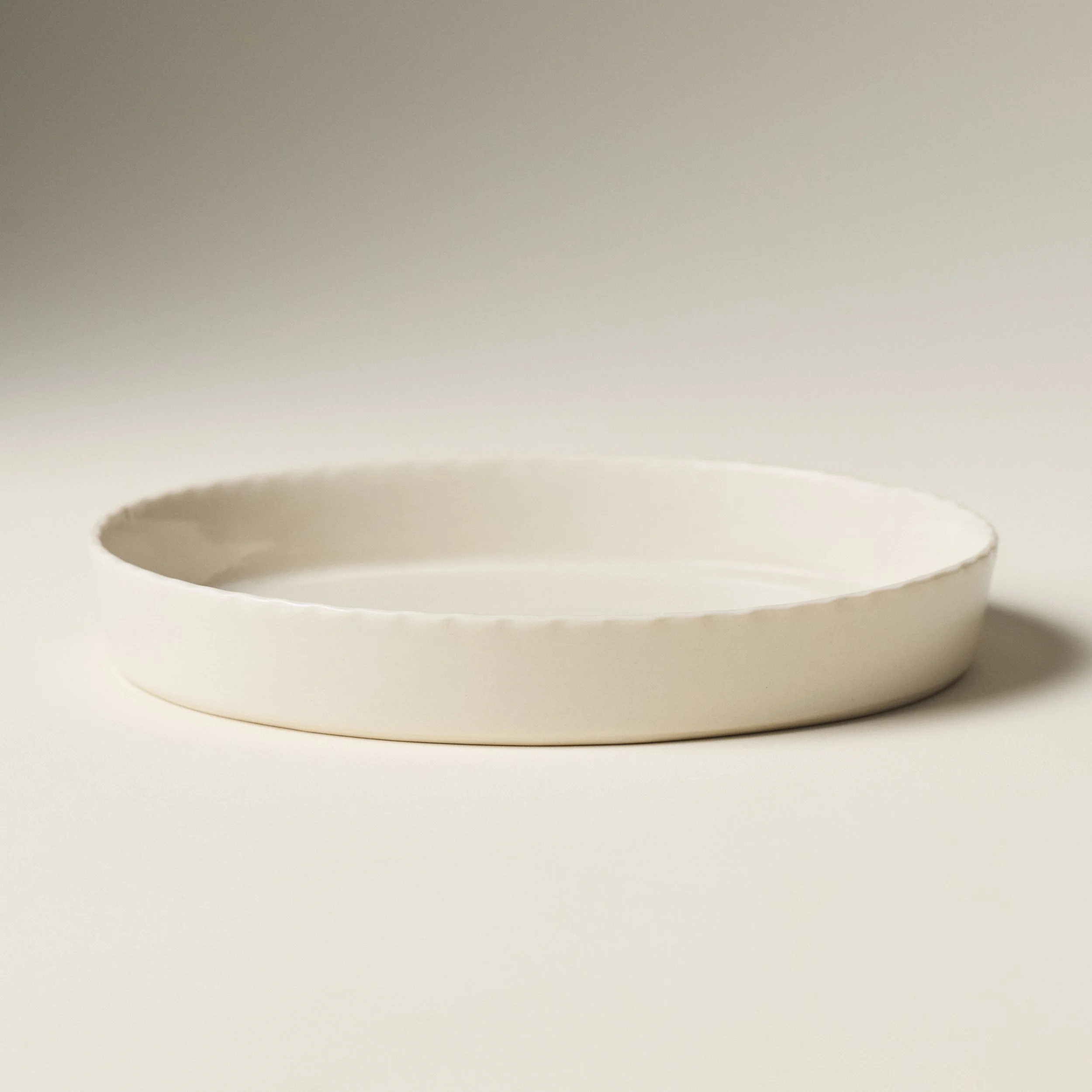 PetitFelts Natural ceramic platter with fluted edge, hand-glazed clear gloss