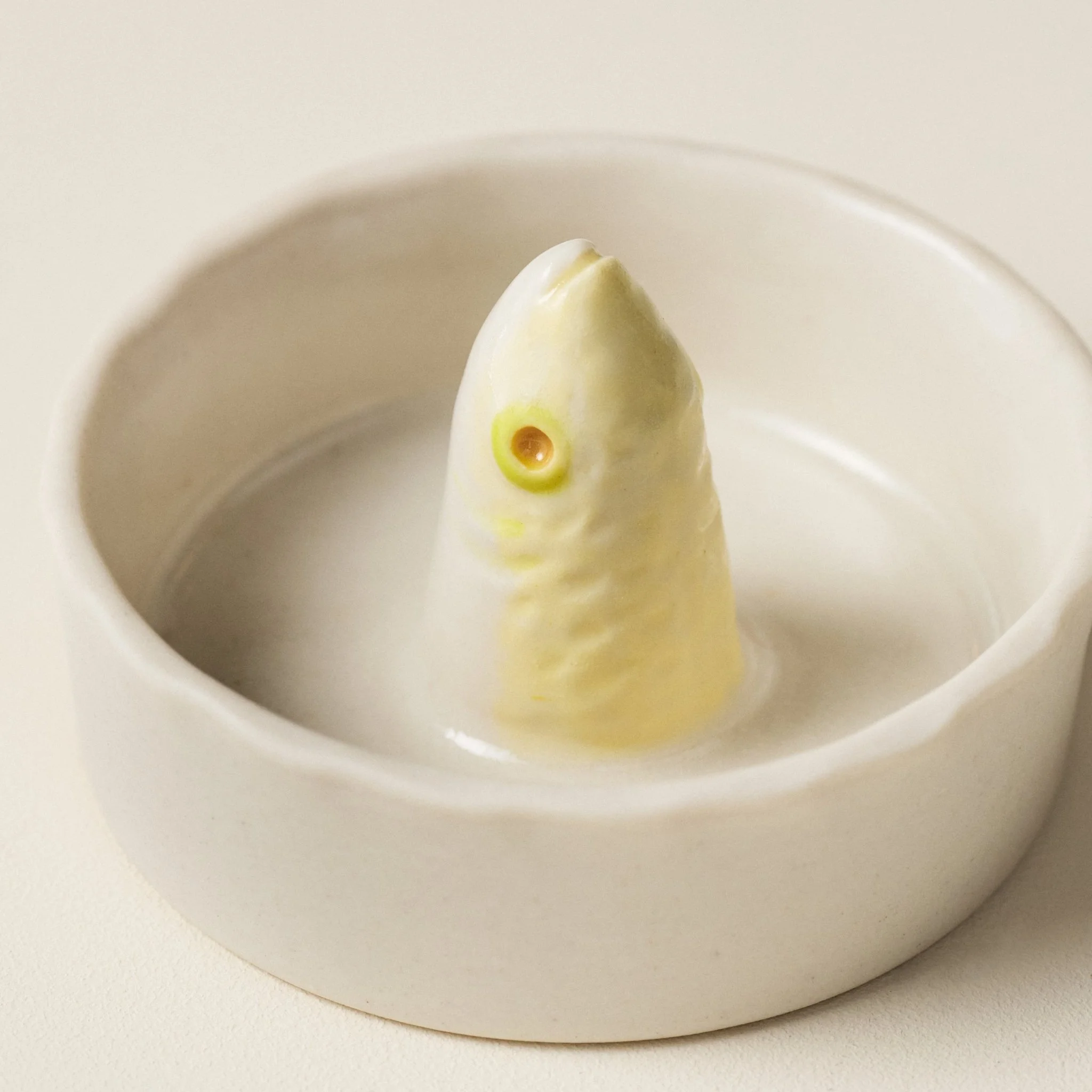 Side view Detail of the PetitFelts Julian Head Moonflower ceramic salt cellar