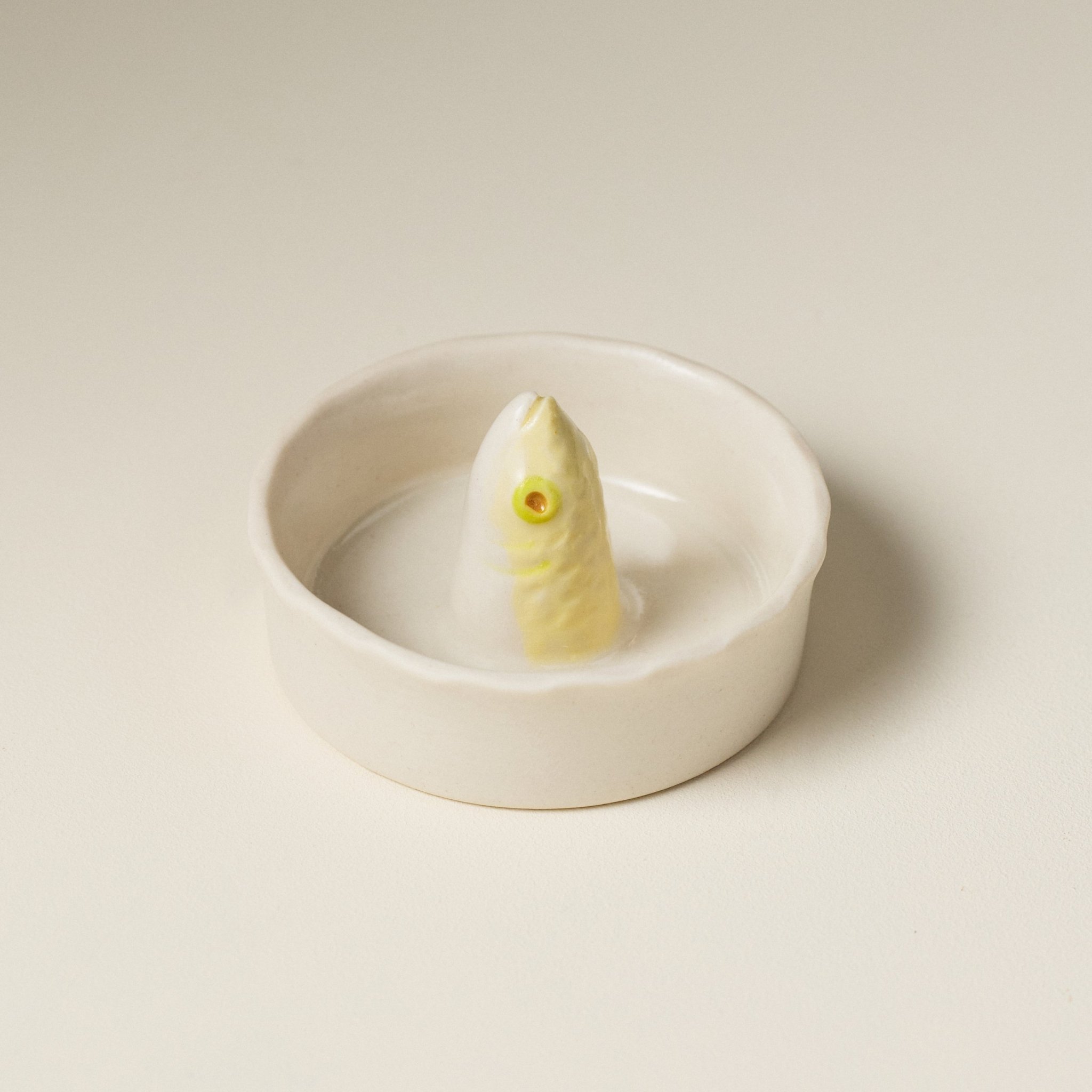 Overhead view of the PetitFelts Julian Head Moonflower ceramic salt dish