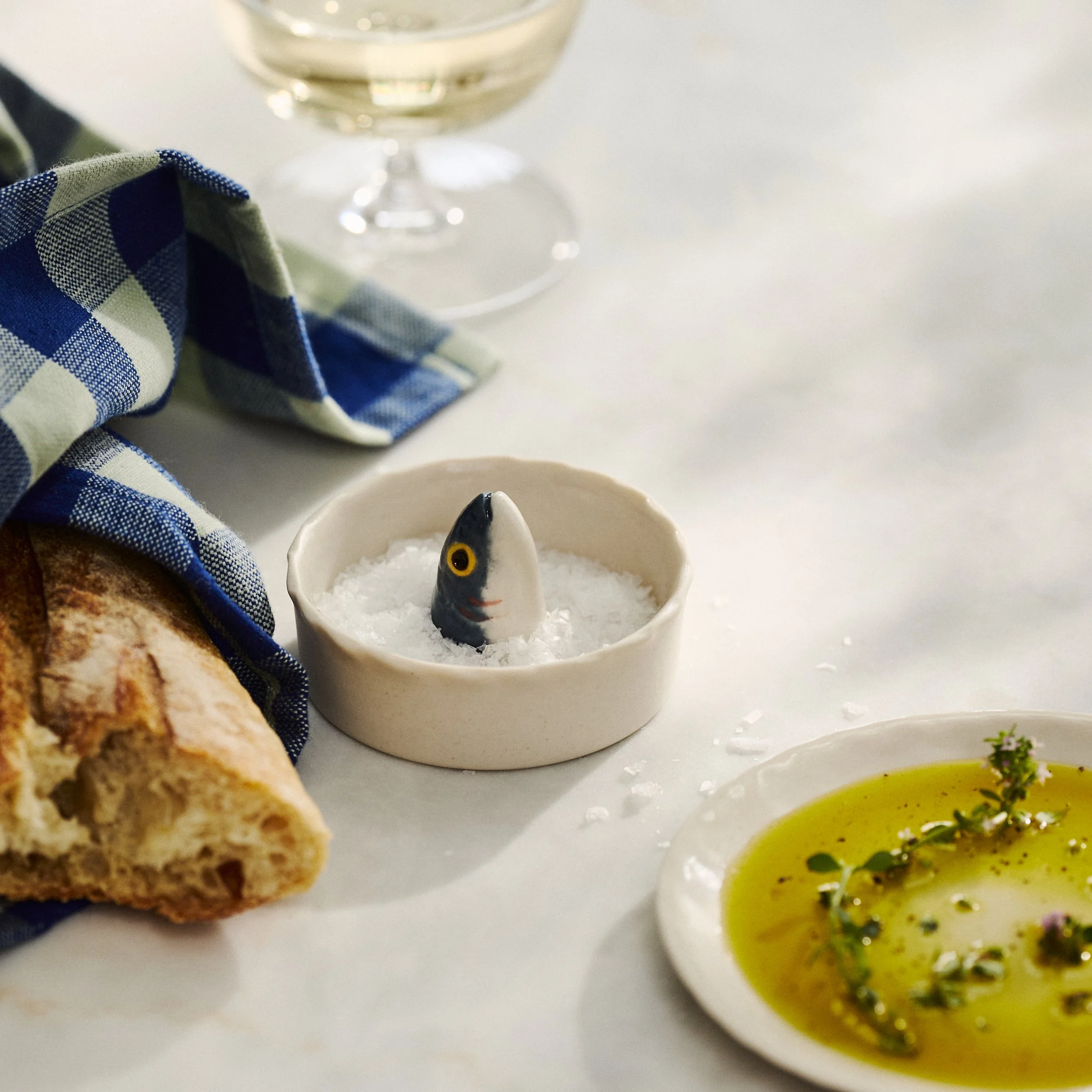 PetitFelts Julian Head ceramic salt cellar styled with bread and olive oil
