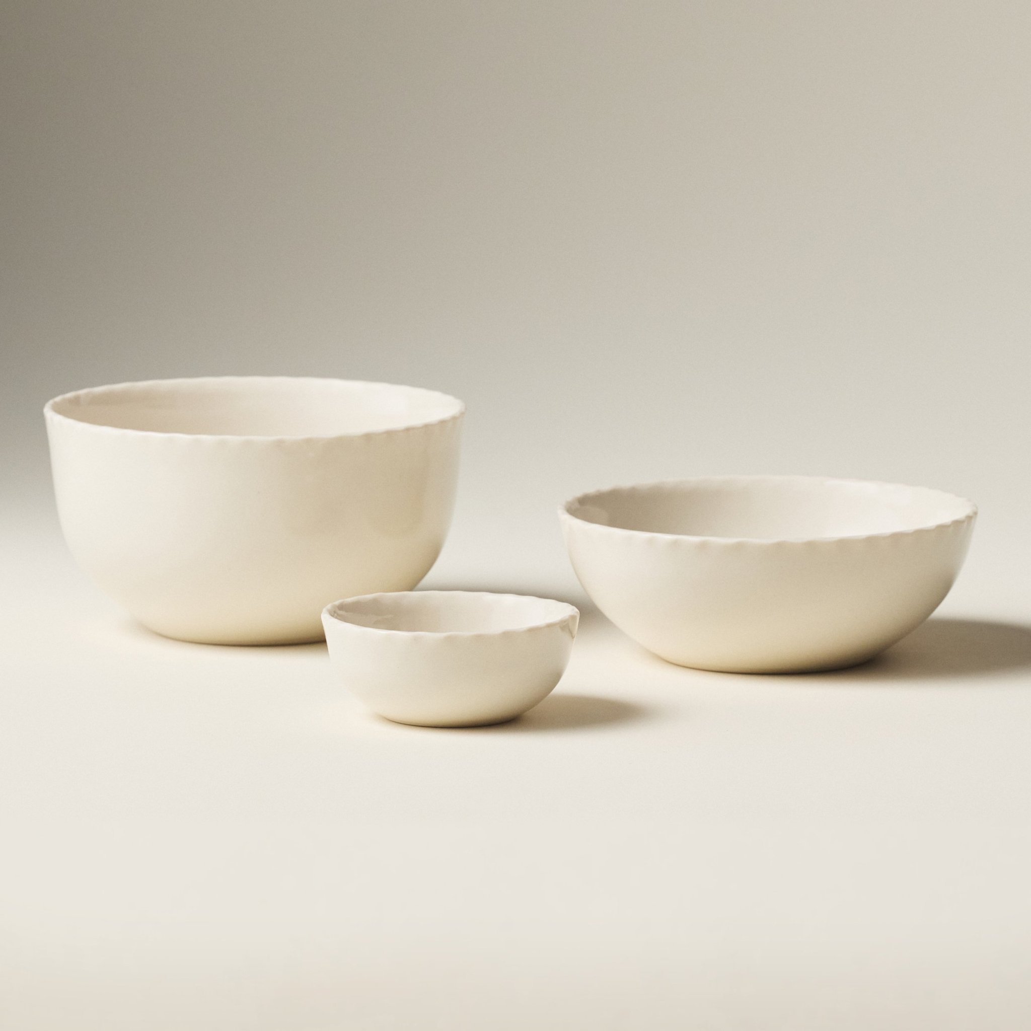PetitFelts Natural ceramic bowls shown together in Petite, Soup, and Dinner sizes