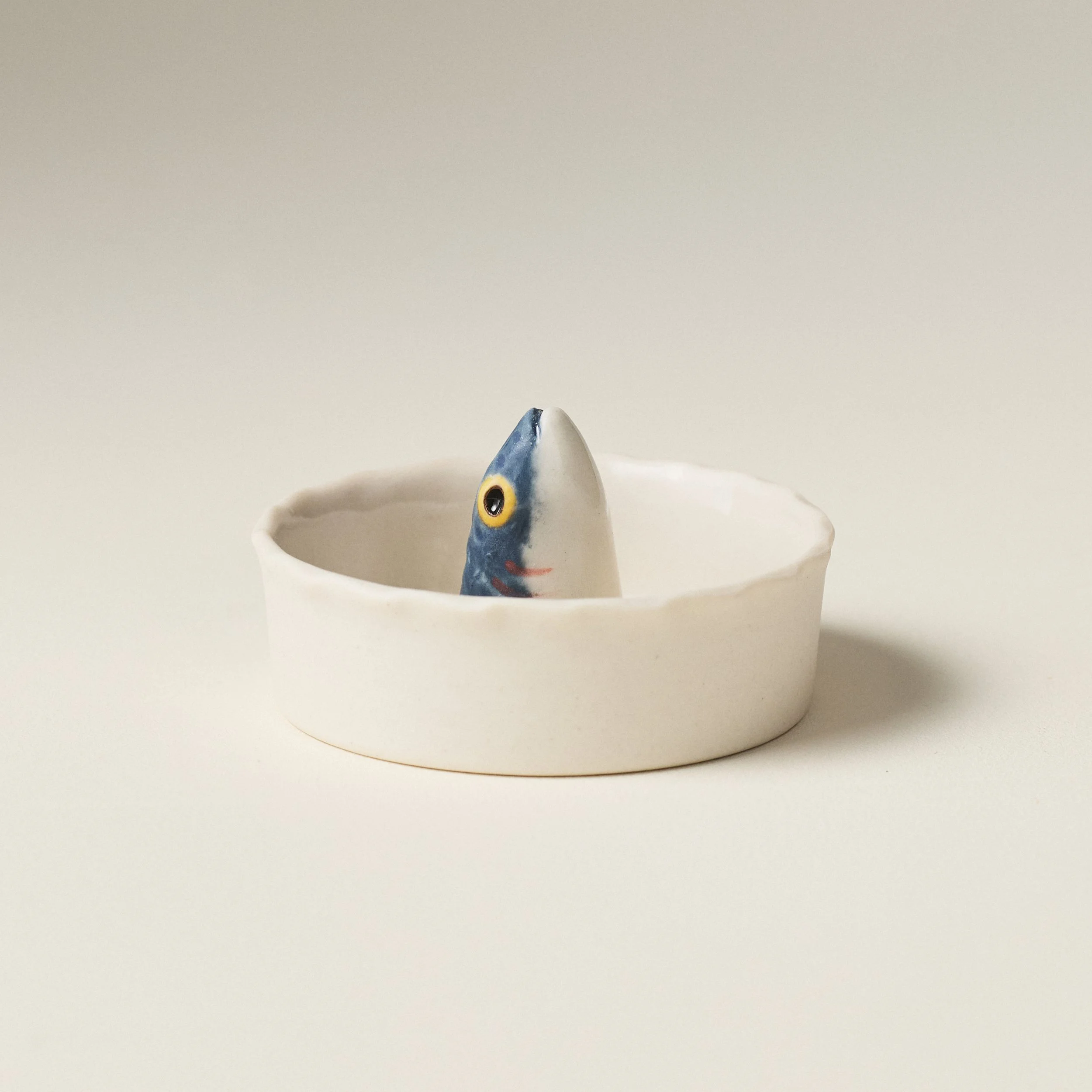 Side view of the PetitFelts Julian Head ceramic salt cellar