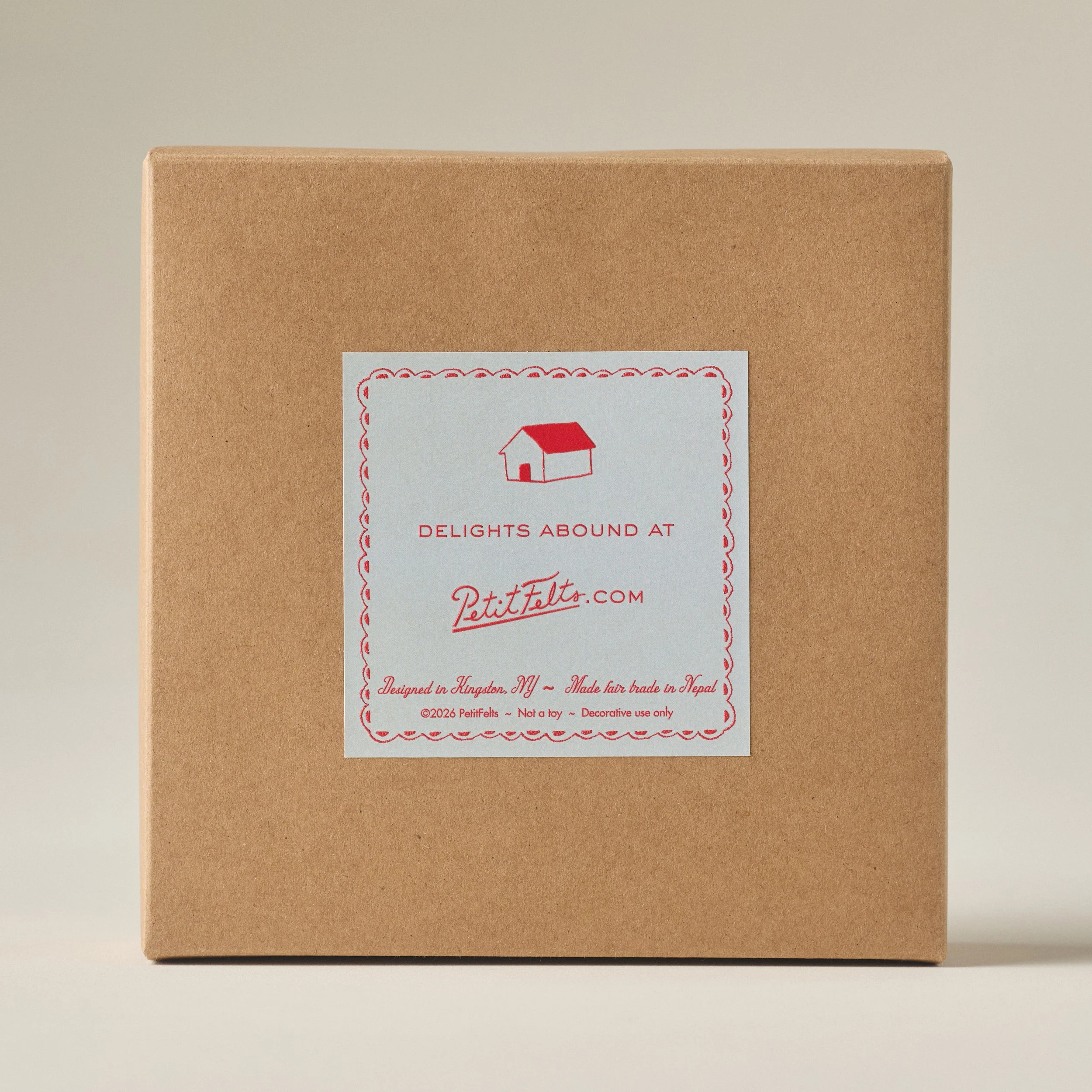 Back label of the PetitFelts donut Christmas ornament set