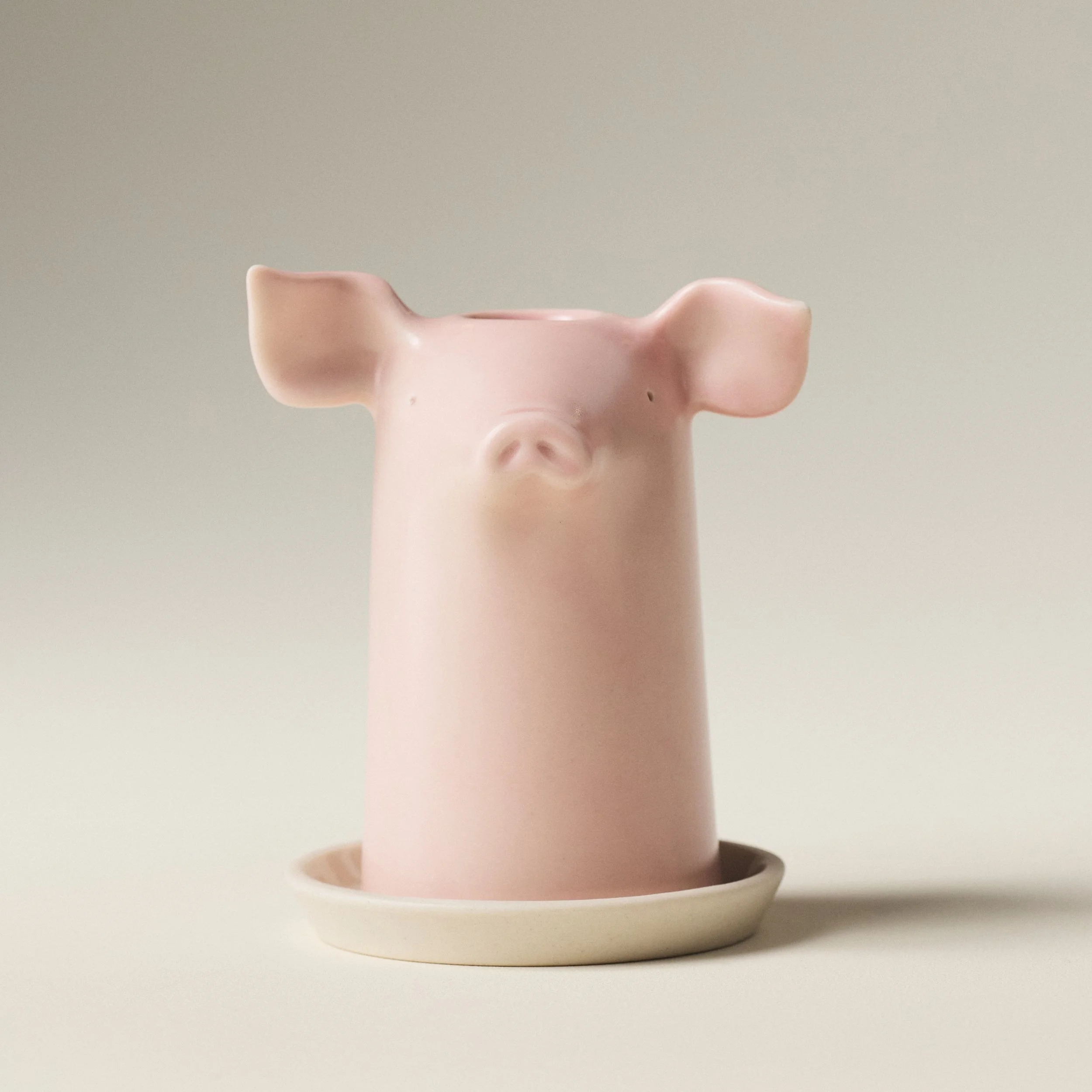 PetitFelts Rose ceramic toothbrush holder shown on its matching saucer tray