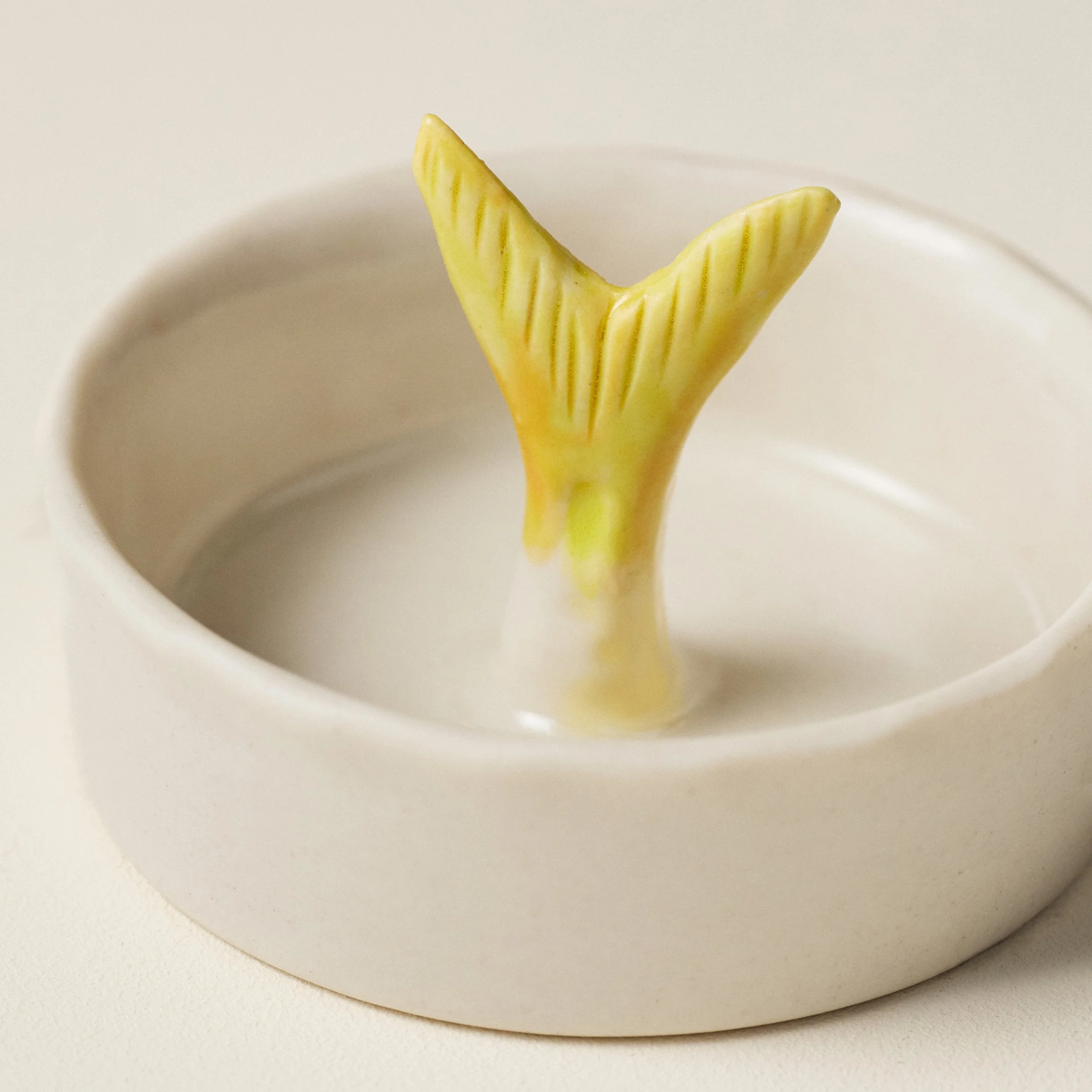 Overhead view of the PetitFelts Julian Tail Moonflower ceramic salt cellar
