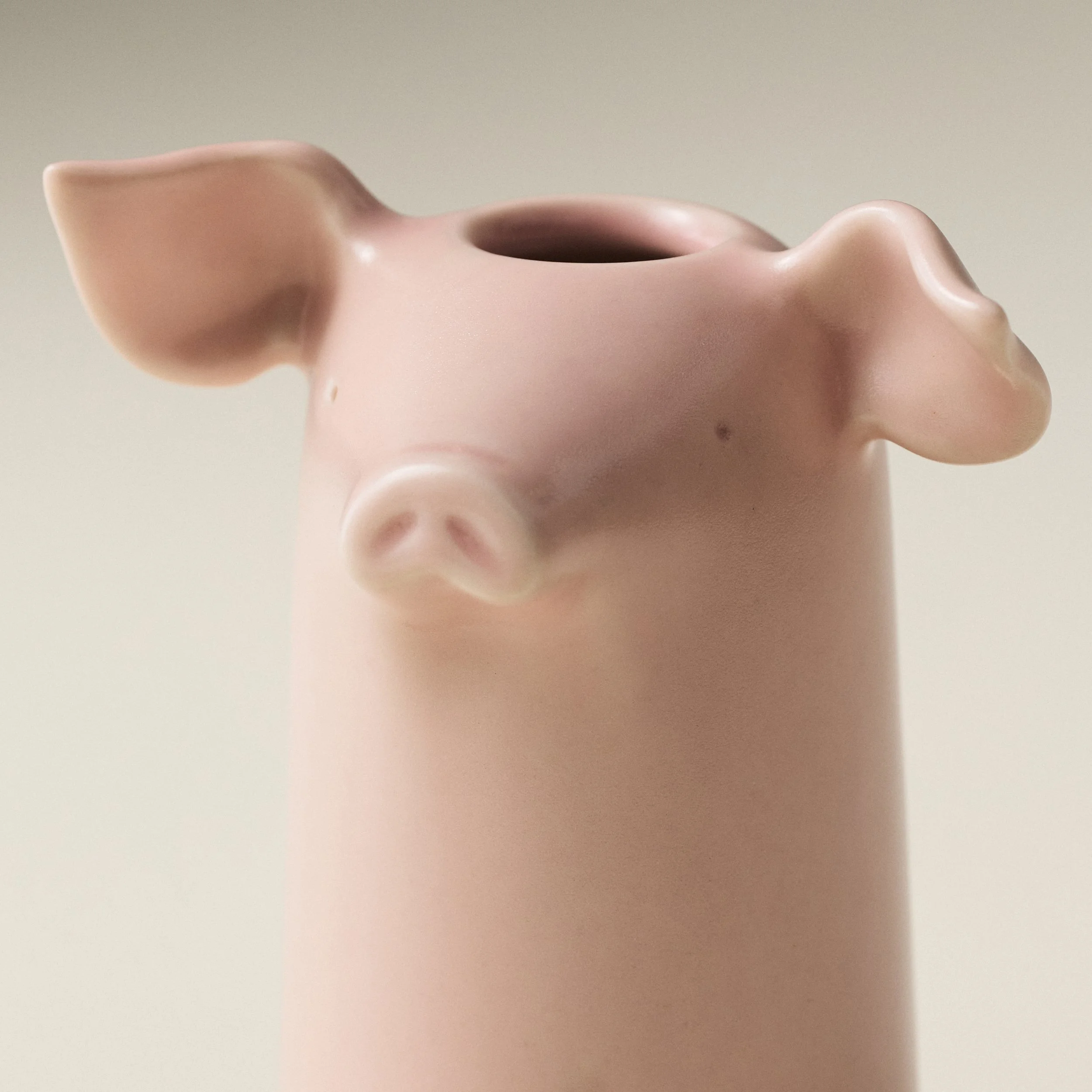Close-up detail of the PetitFelts Rose toothbrush holder's face and ears