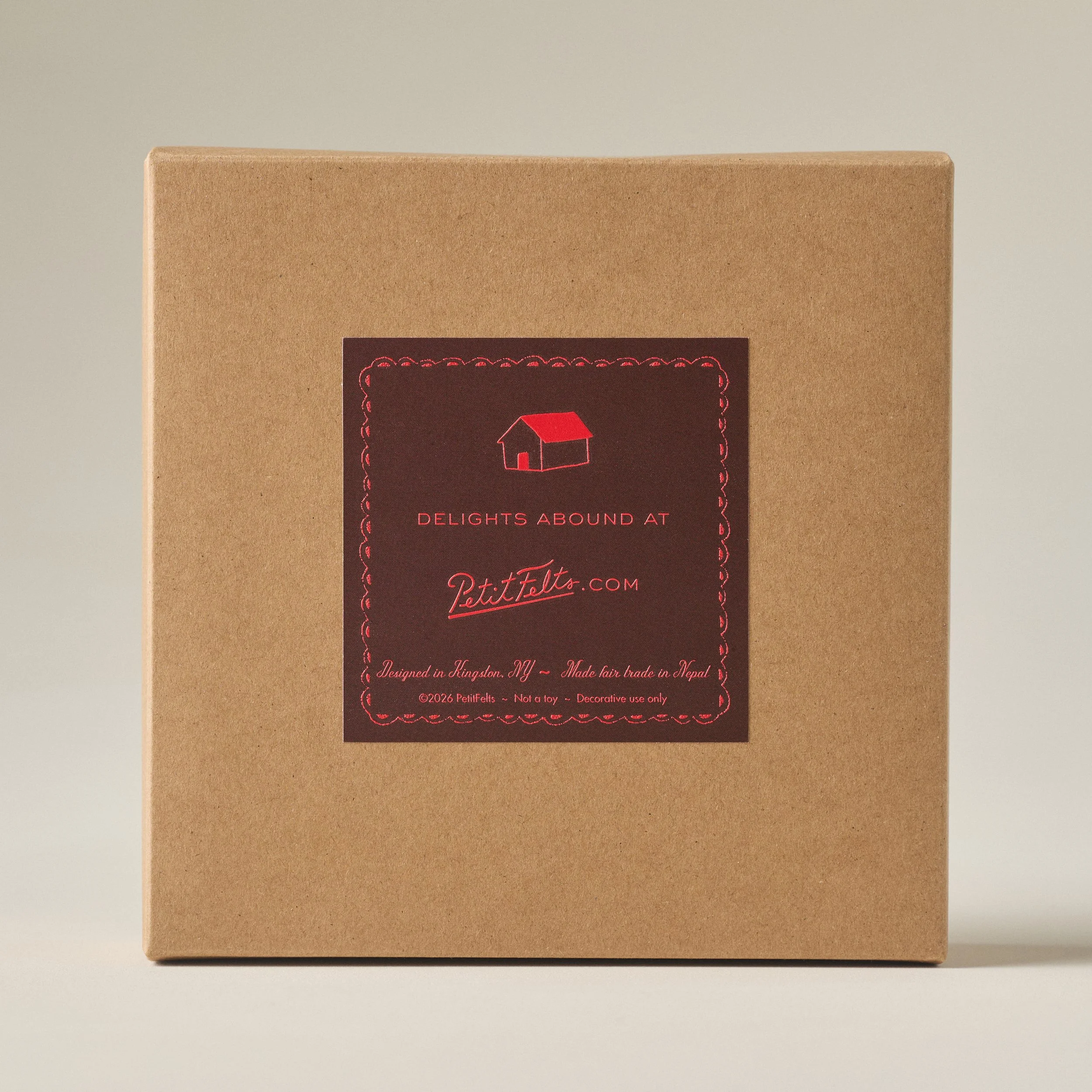 Back of the PetitFelts Bagel ornament set box label