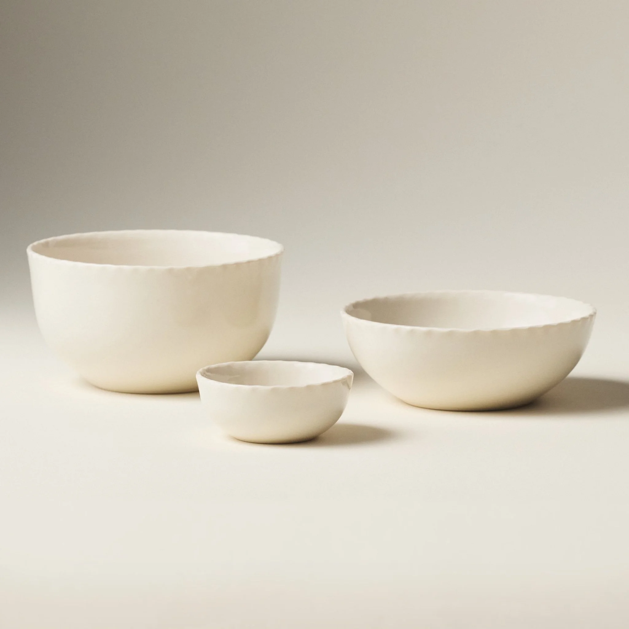 PetitFelts Natural ceramic bowls shown together in Petite, Soup, and Dinner sizes