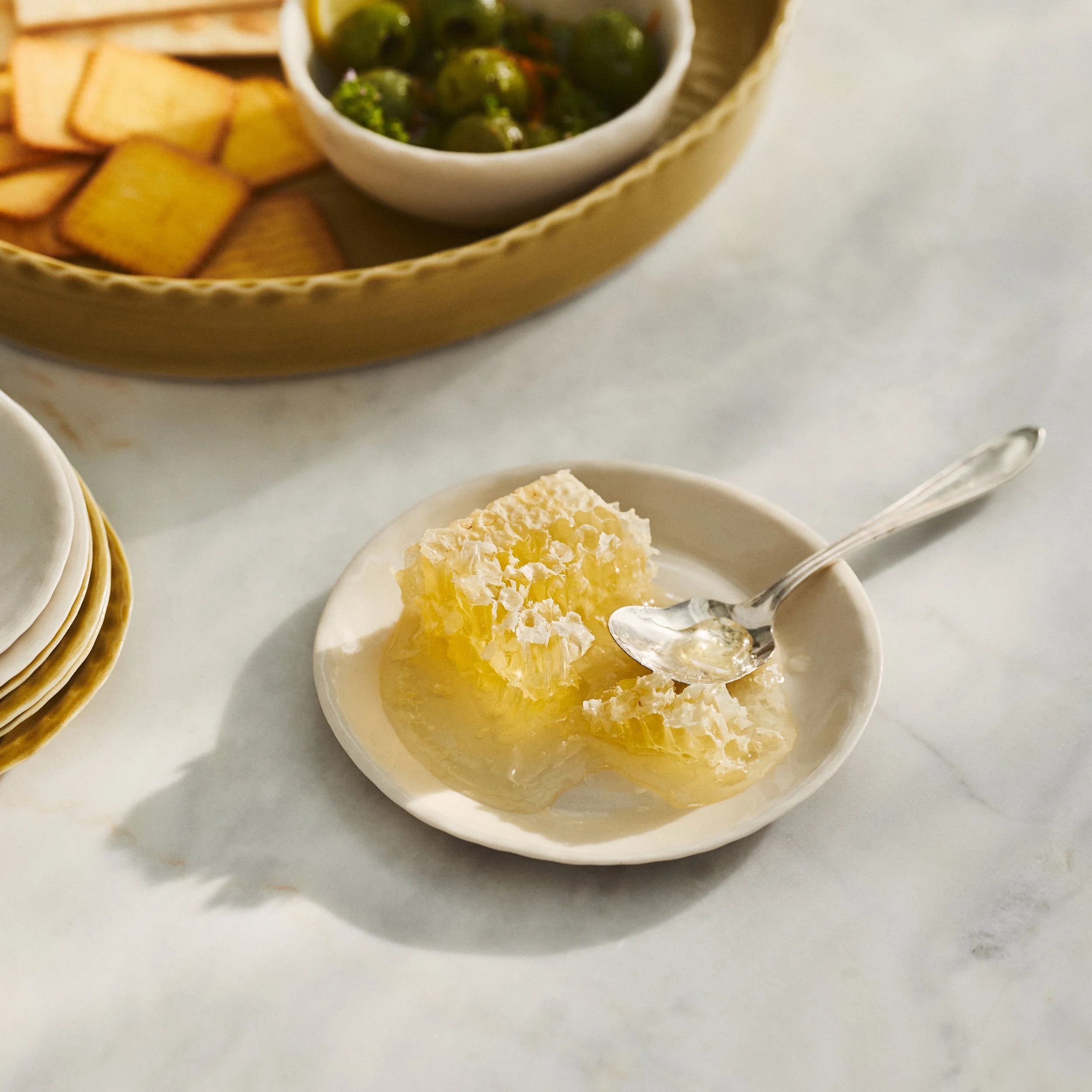 PetitFelts Natural small ceramic plate styled with honeycomb and crackers