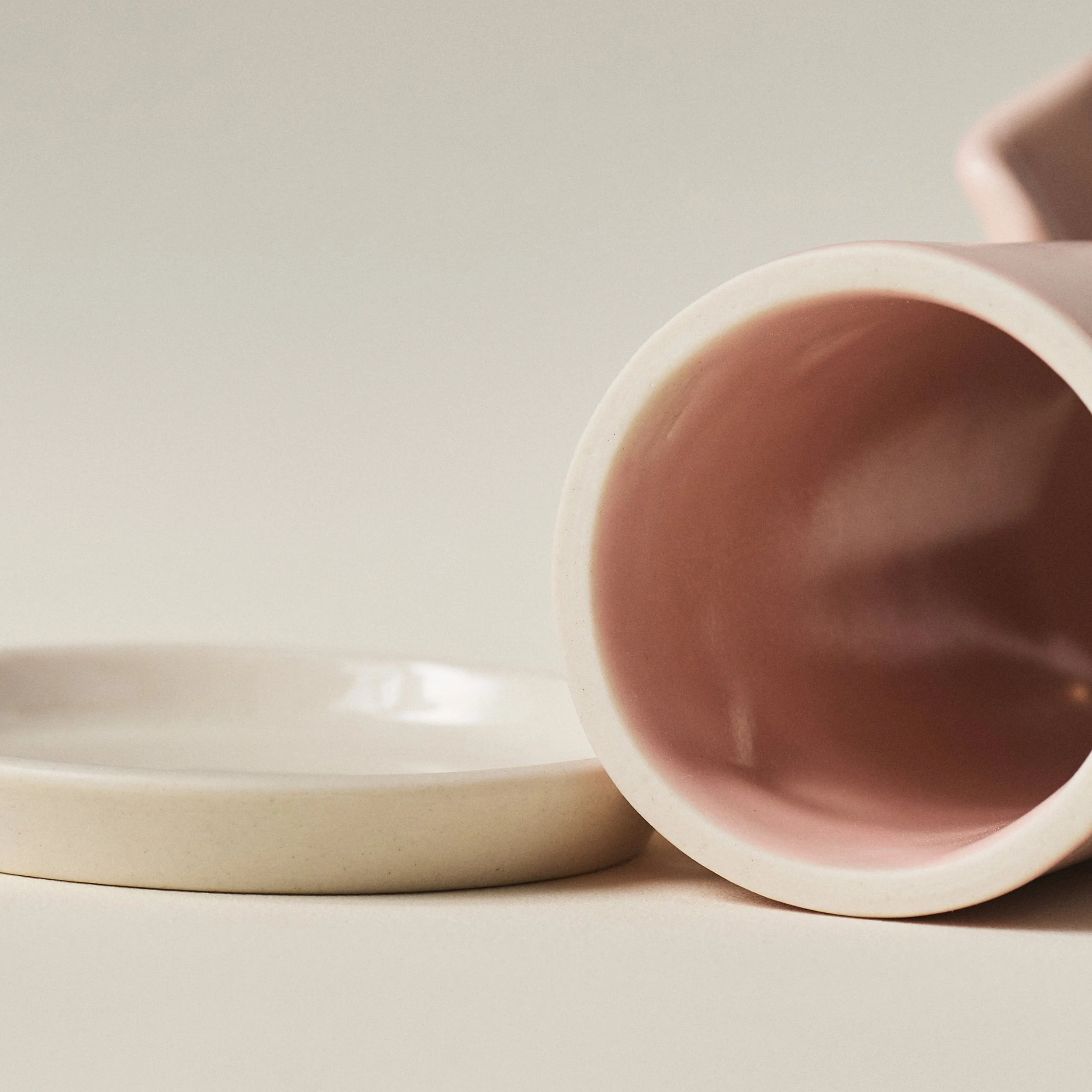 Underside view of the PetitFelts Rose toothbrush holder's hollow interior