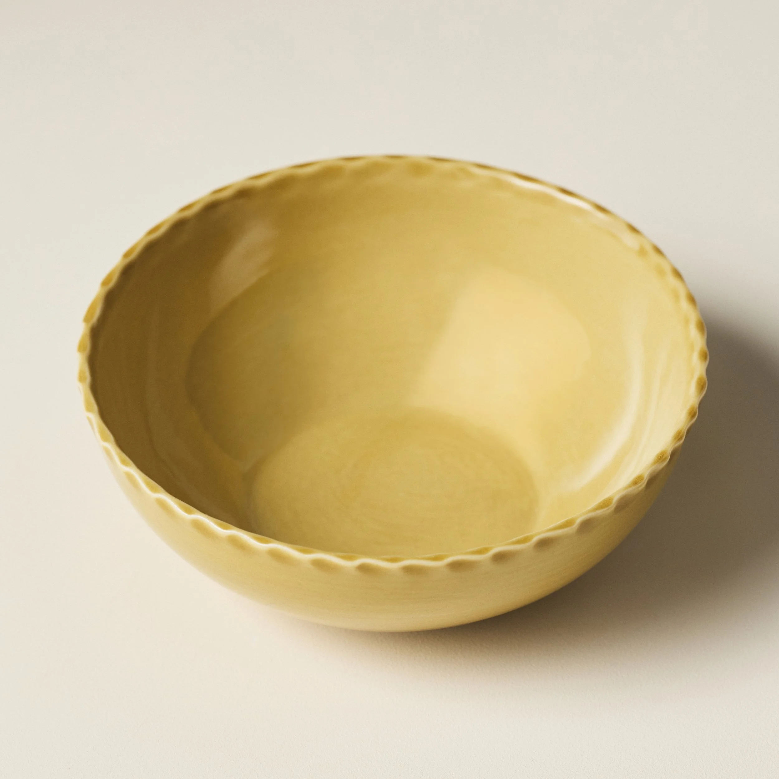 Overhead view of the PetitFelts Fennel ceramic soup bowl's glazed interior