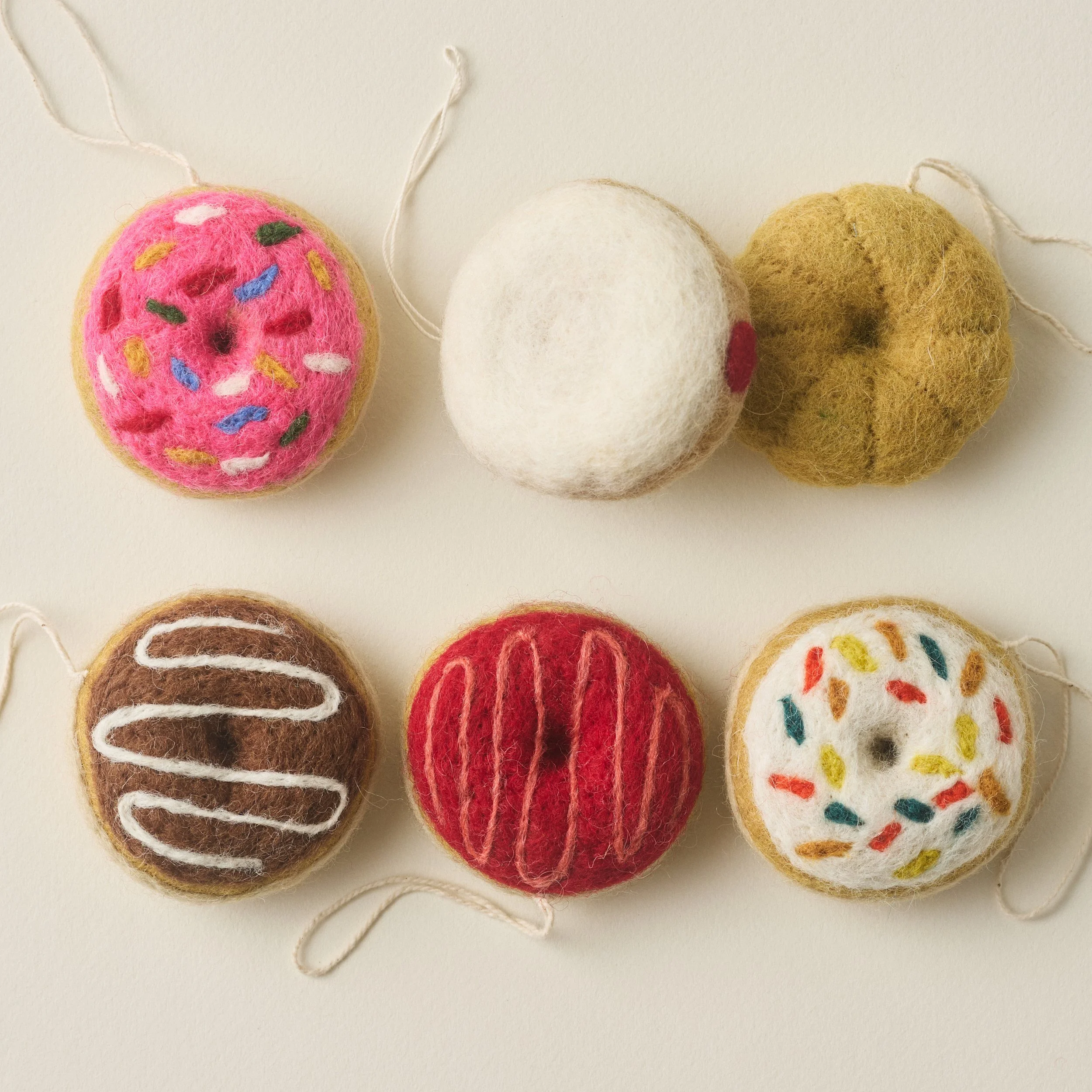 PetitFelts Sprinkle, Jelly, Cruller, Strawberry and Chocolate Donut Ornaments included in the set