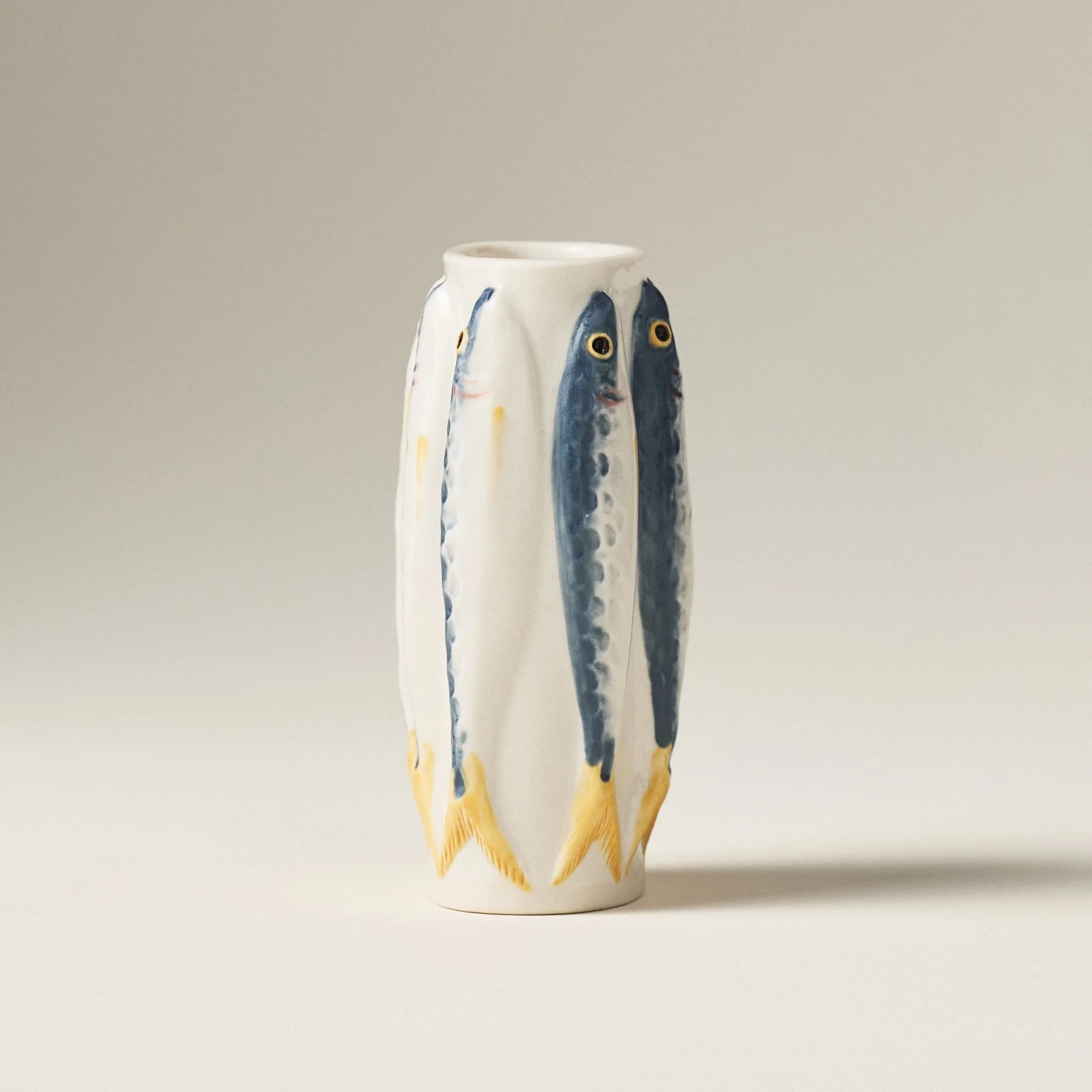 Side view of the PetitFelts Julian sardine vase showing tail detail