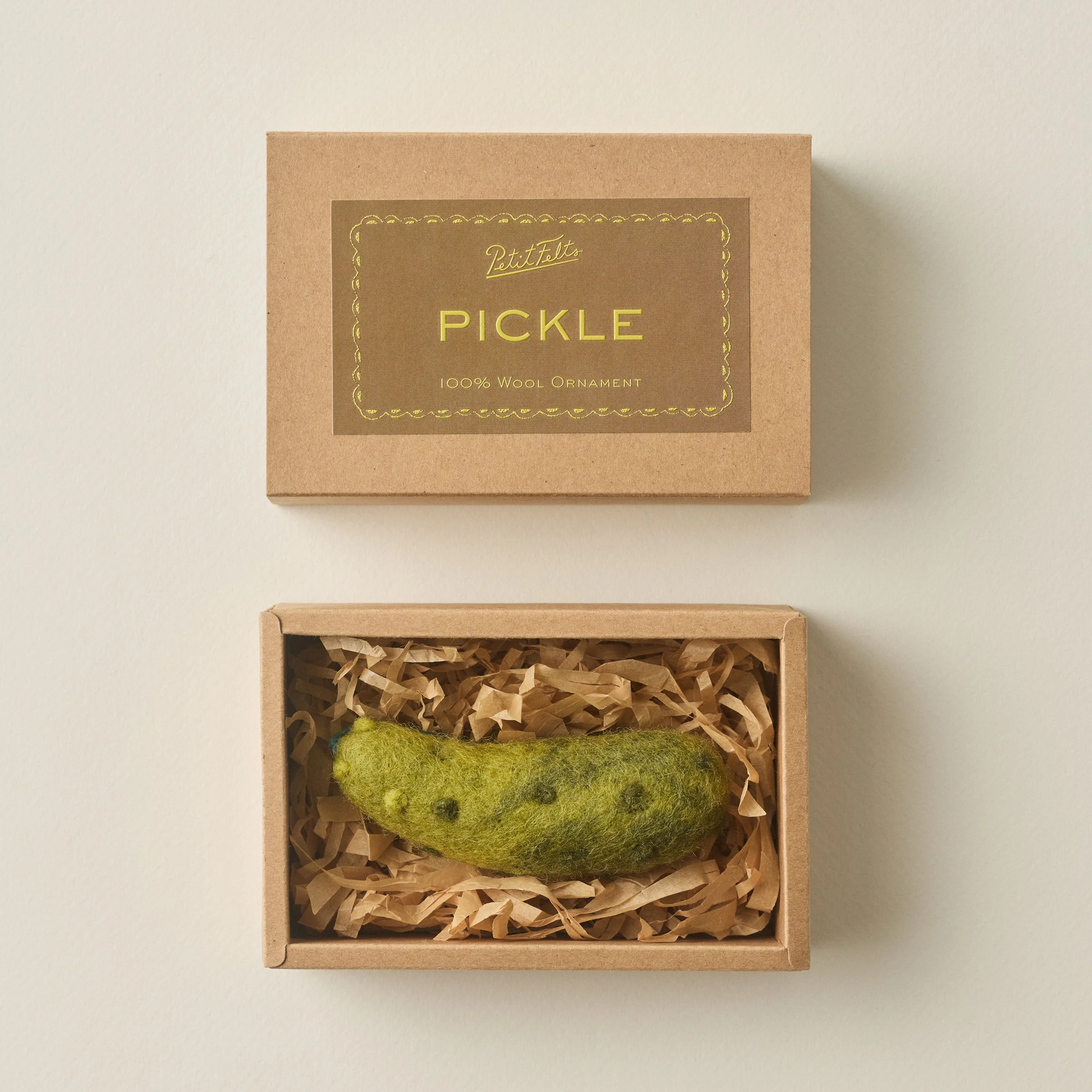 PetitFelts Christmas Pickle Ornament box open showing the pickle inside