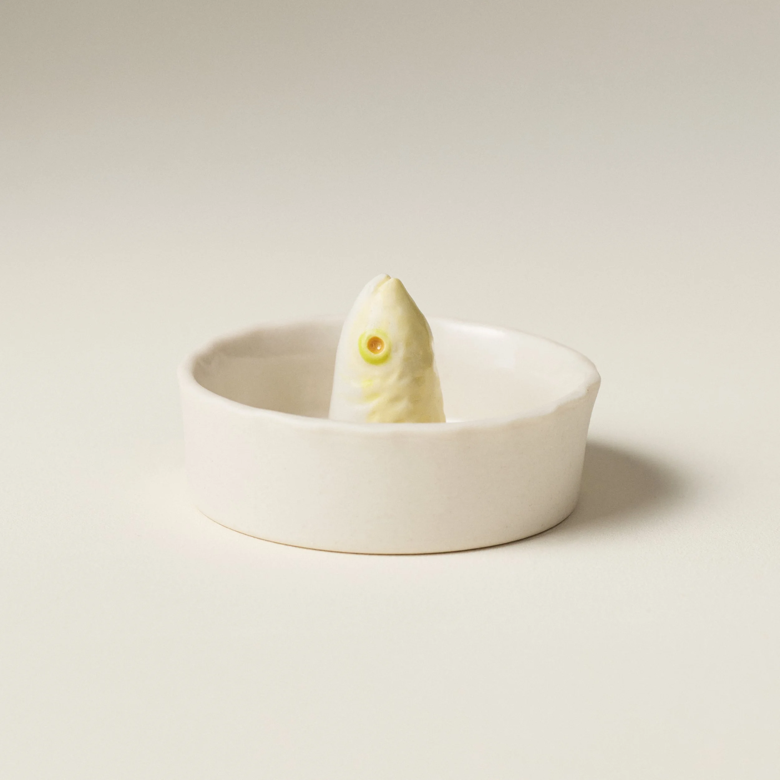 Side view of the PetitFelts Julian Head Moonflower ceramic salt cellar