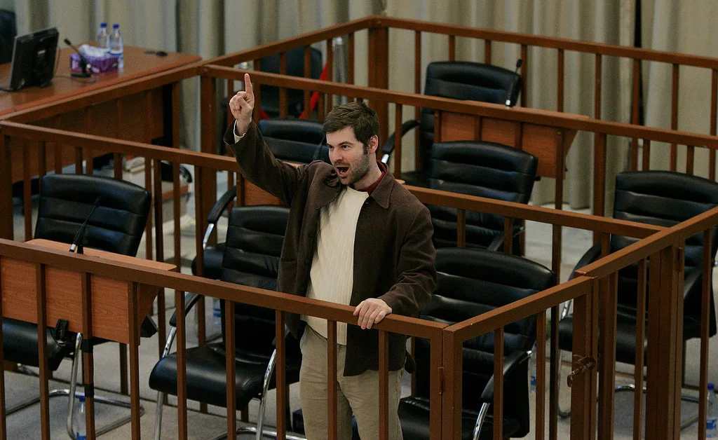 22 - Chris imitating Saddam Hussein.jpg