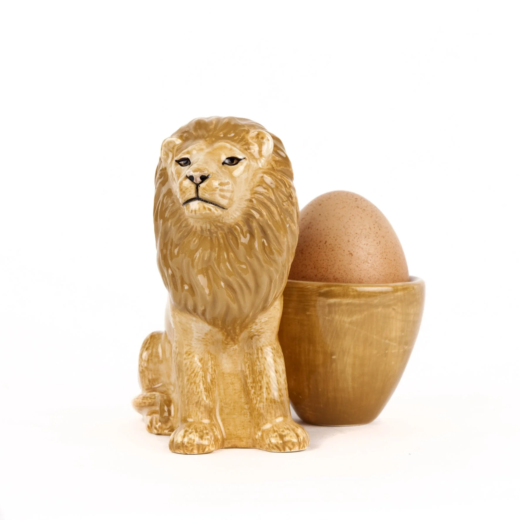 Lion with egg cup 03.jpg
