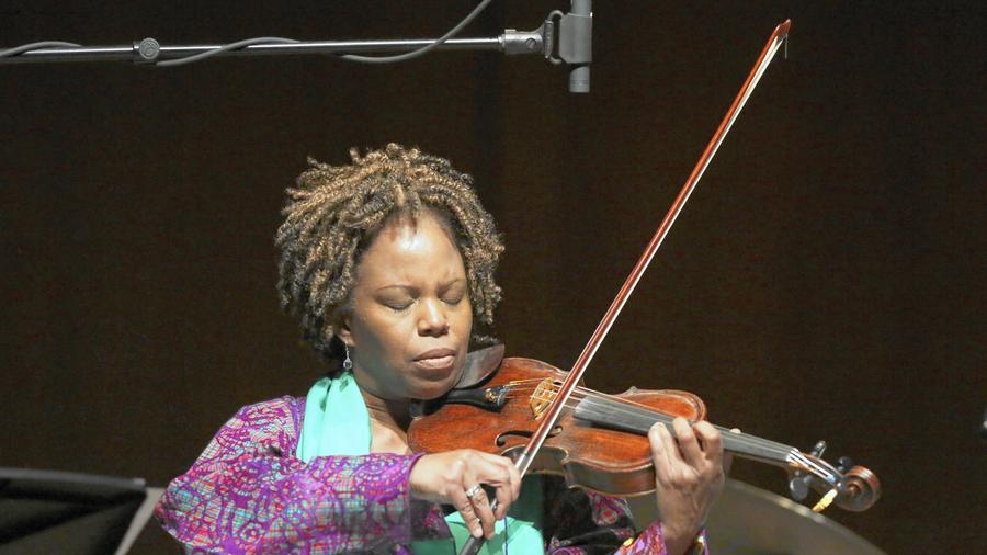 Regina Carter, shown here at the University of Chicago's Logan Center for the Arts on Friday Oct. 24, 2014. Carter will play with pianist Xavier Davis to close out the first night of the ninth annual Hyde Park Jazz Festival. (Armando L. Sanchez / Chicago Tribune)