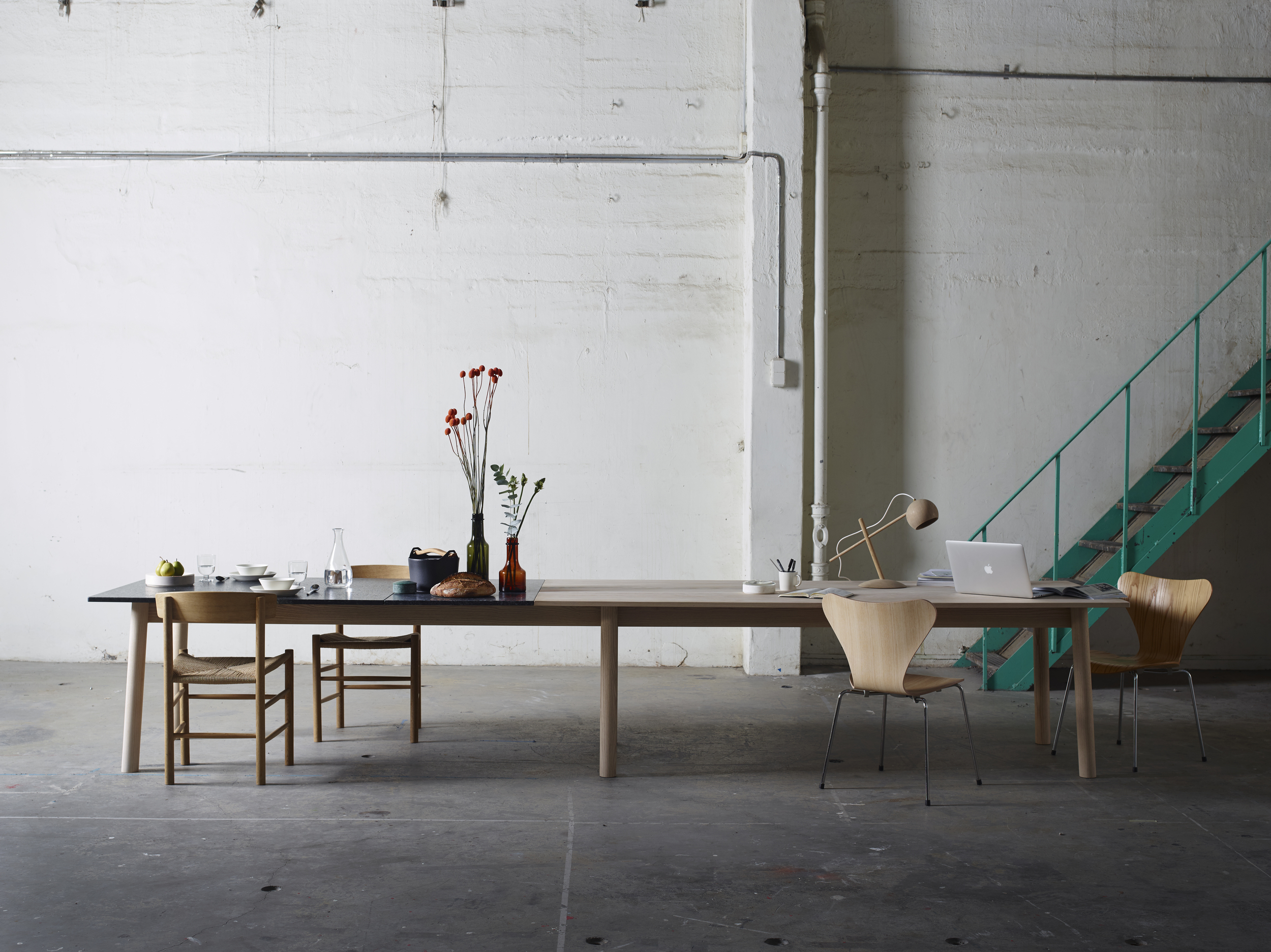 As Long As You Like is an archetypical long table that can be tailored to any length. The mixed materials of the table’s surface create a pattern within the object whilst illustrating the table’s modularity. The prototype is constructed from solid oak base and tops of oak and Larvikite, a stone unique to norway from the Lundhs quarry in Larvik. The essence of the project is to create a a table that is as long as you like. To make this possible the object has to consist of several tops and set of leg modules. This is enhanced by composing contrasting materials on the surface and support it on a modular base with robust yet minimal proportions. A collaboration with Sverre Uhnger Photo © Siren Lauvdal