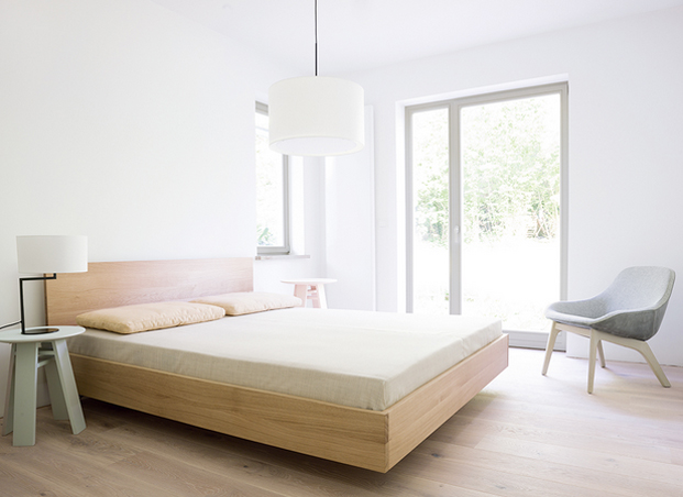 Zeitraum Noon Table Lamp, Morph Lounge chair, Bondt Side table, and Simple HI Bed from Zeitraum