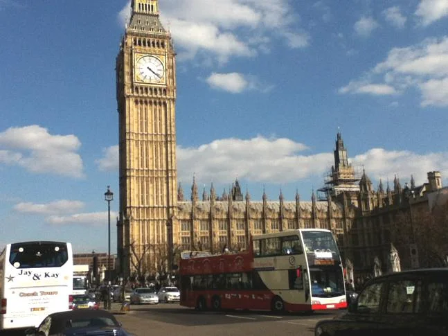 Back in London cycling home, blue skies