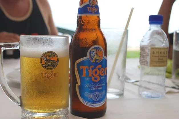 Ice cold beer after playing in the waves