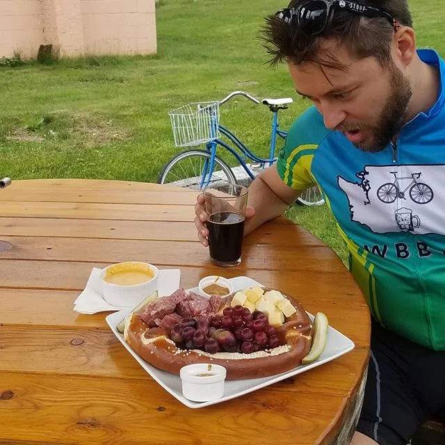 This is what you get when you order the charcuterie in Harrison, Idaho at the Cycle Haus. Notice the fist sized bowl of melting, warm, beer cheese. TAKE NOTES, SEATTLE. I don't wanna see your cheap, wimp ass McDonalds ketchup cup of frigid cheese &qu