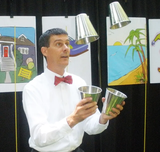 Juggling cups help all ages understand budgeting with Now, Soon, Later, and Share. (Older students get a more detailed budget example with either fractions or percentages.)