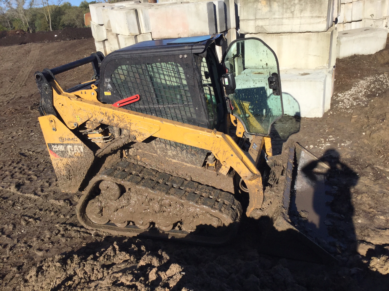 Last but not least (except in size) the skid-steer. This is a familiar one, it can zip around, carry modest loads, it can hold a fork lift or a bucket, I use it to shave off the edges of windrows if they're too wide. It has the most variety of uses, like a swiss army knife.