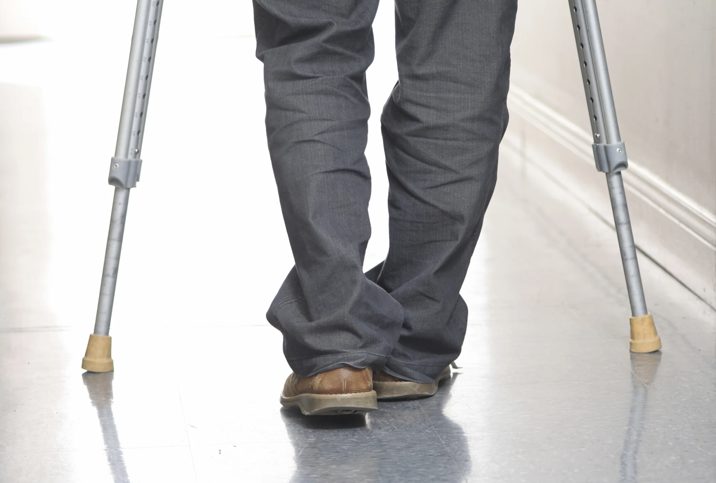 using-crutches-after-knee-surgery.jpg