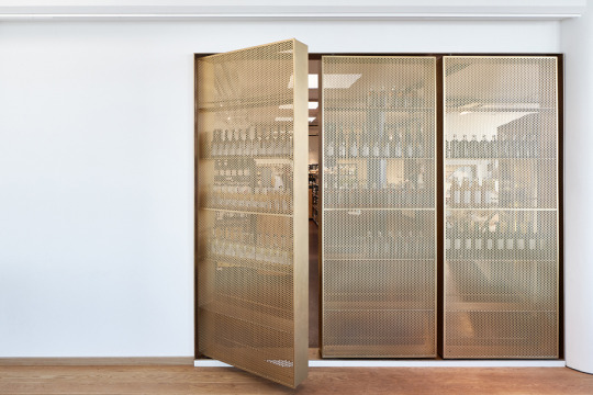 Beverage storage by Retail Architects and Årstiderne Arkitekter