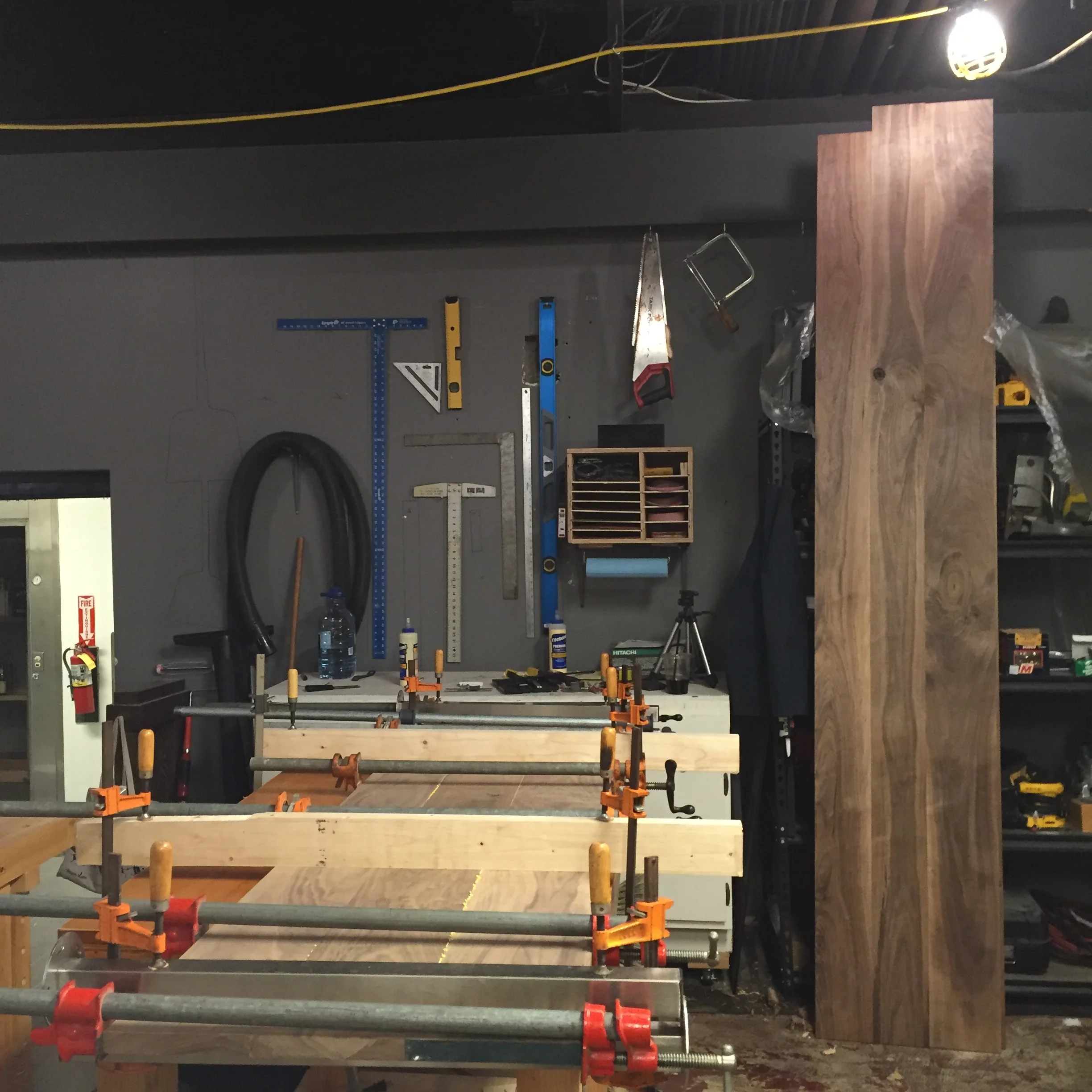 Glueing up. Using jointed 2X4's and aluminum Ikea legs as cauls :)
