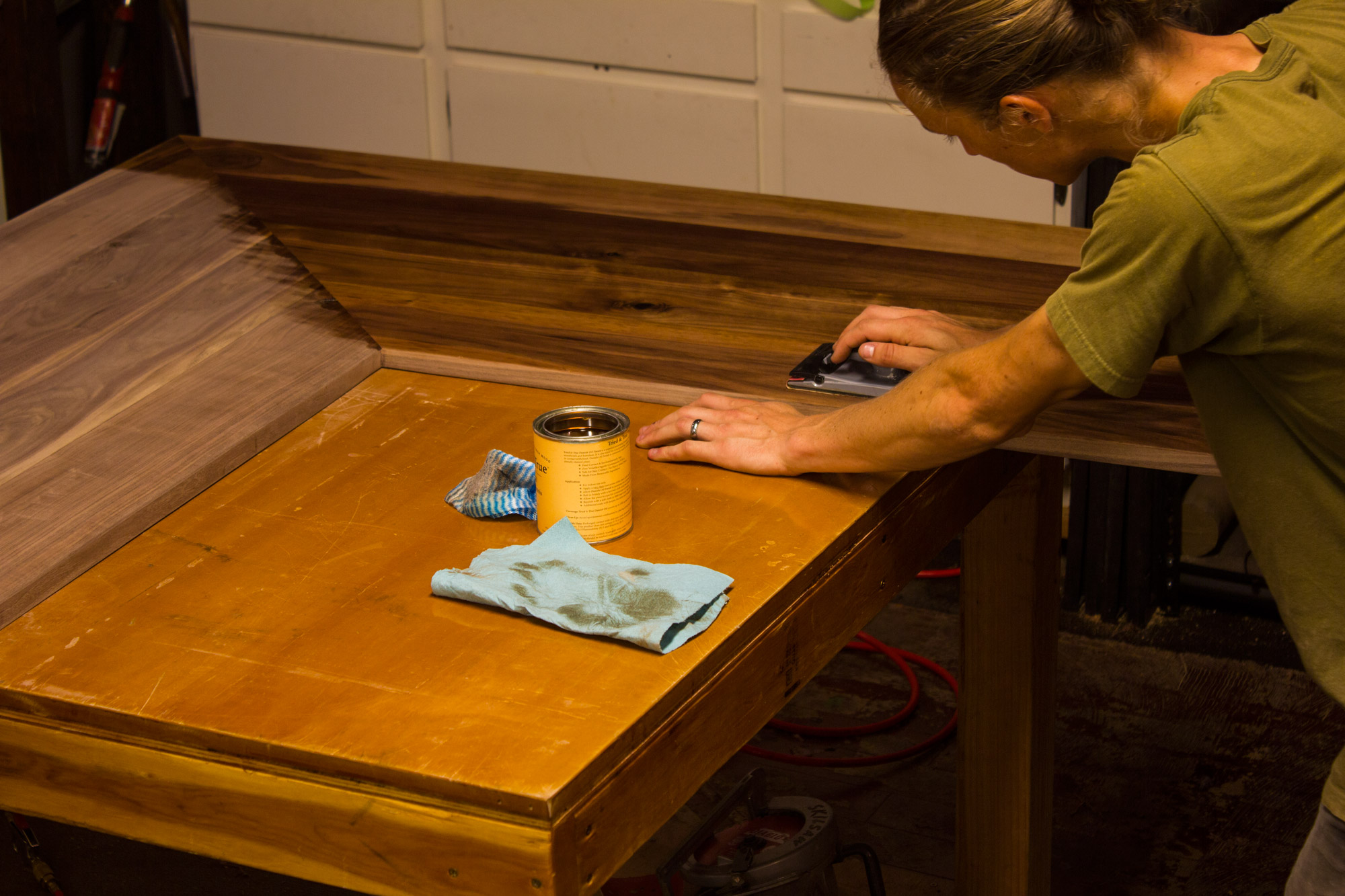 Wet sanding using Tried and True Danish Oil. I'm using a hand sander with 320 grit paper and sanding with the grain right after a light coat of oil. I wait 5 minutes and wipe completely clean against the grain.