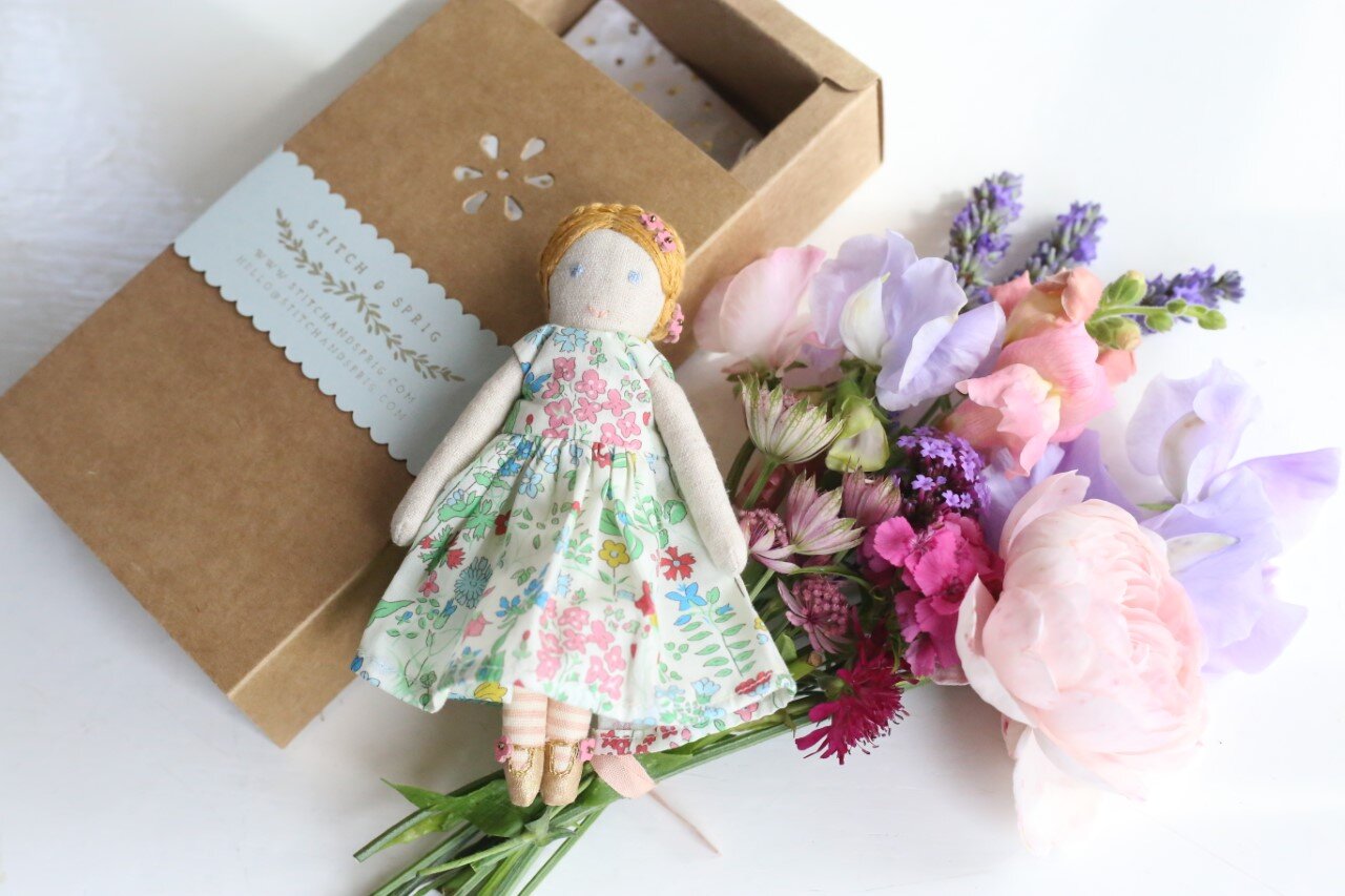 TIny Doll with Box and Flowers.jpg