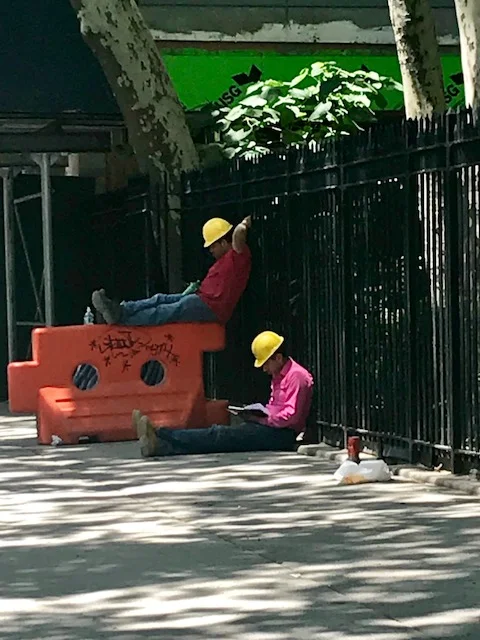 These guys looked like they were hired actors to play construction workers taking a break! It made me happy to see them slowing down too. 