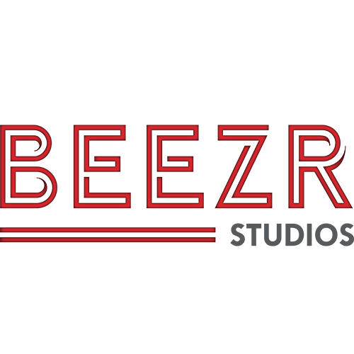 Neon-style sign that reads "BEEZR STUDIOS" with the word "BEEZR" in red and "STUDIOS" in gray, featuring horizontal lines beneath the text.