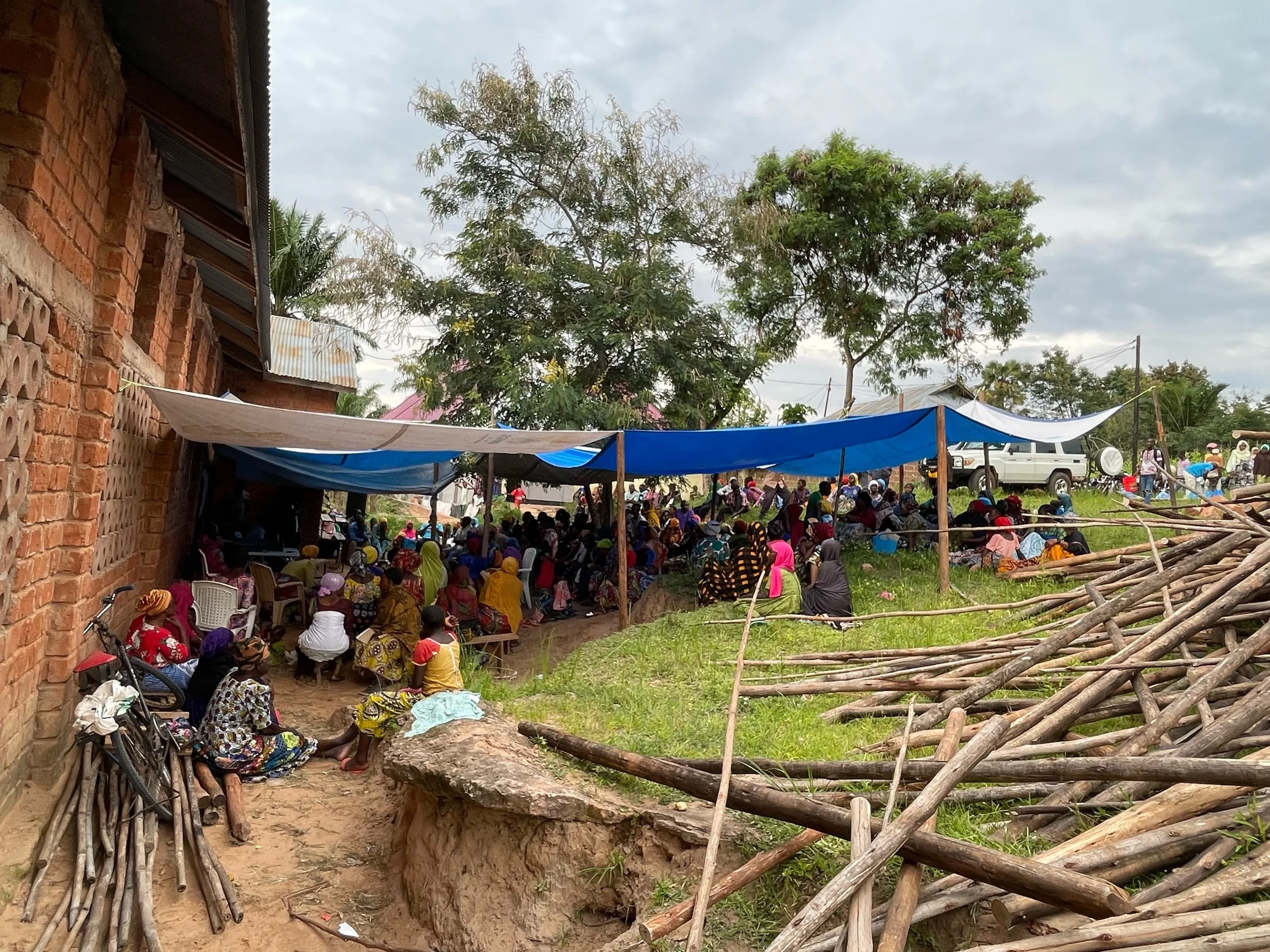100 people waiting and watching the Jesus film on a 32 inch TV.