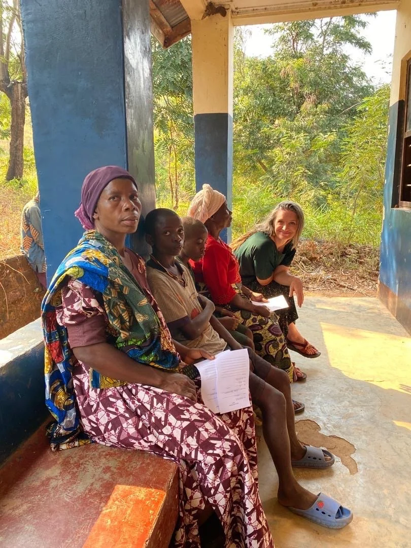 Bek engaging with waiting patients