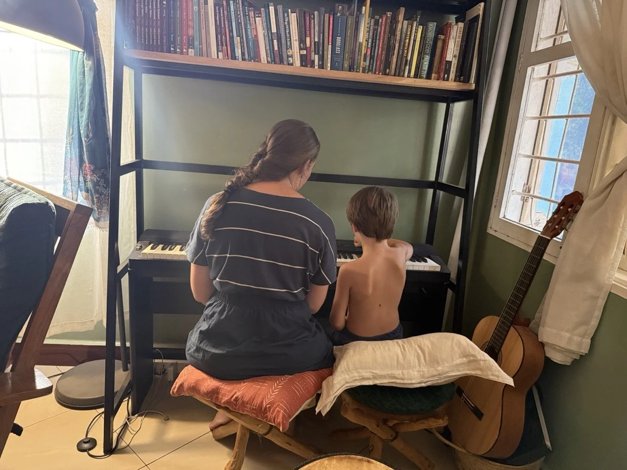 Carolina teaching Zeke the keys