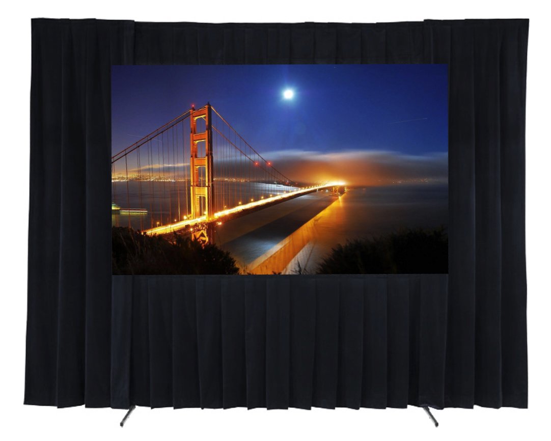 Photograph of the Golden Gate Bridge at night with city lights and moon in the sky, displayed on a black curtain backdrop.