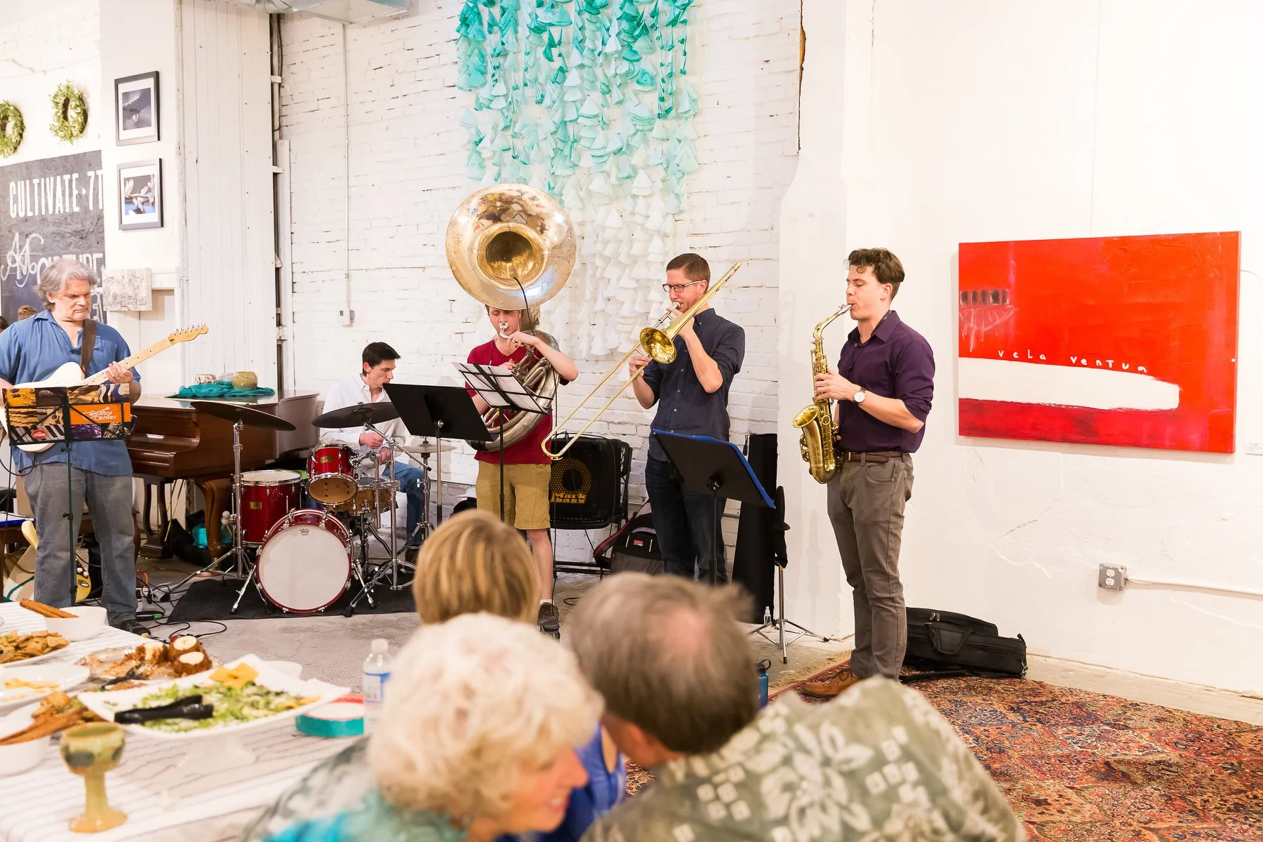 Chuck Jennings (far left) plays alongside other local artist at Cultivate 7twelve’s monthly jam sessions. (photo by Cultivate 7twelve)