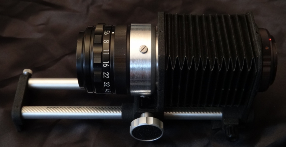  Lens: Nikon EL-Nikkor 150mm f/5.6-45. Bellows: Soligor. T-Mount: random Amazon seller. Adapters to Kludge all of these together: me.