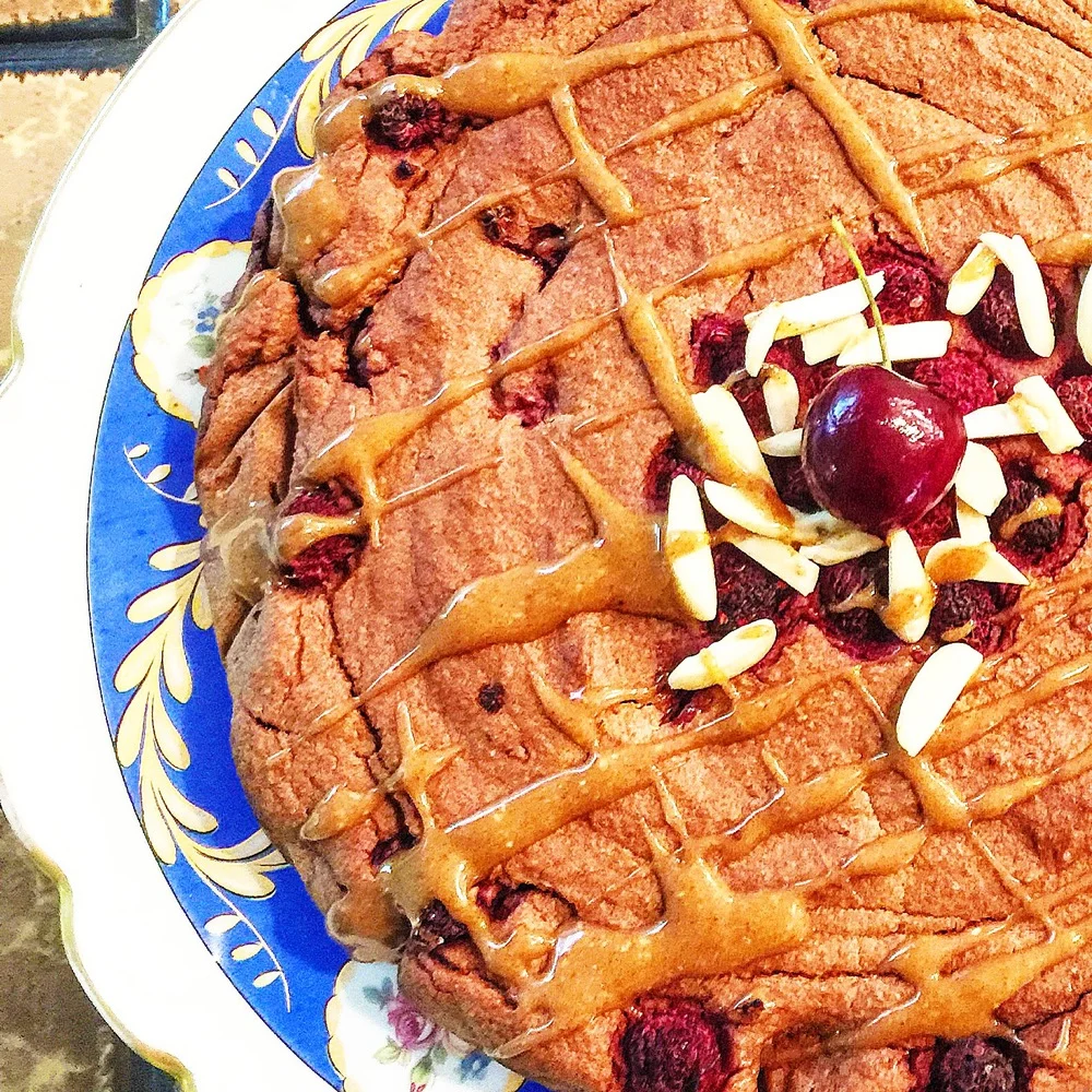Tart Raspberry Granola Cake with Almond Honey Drizzle