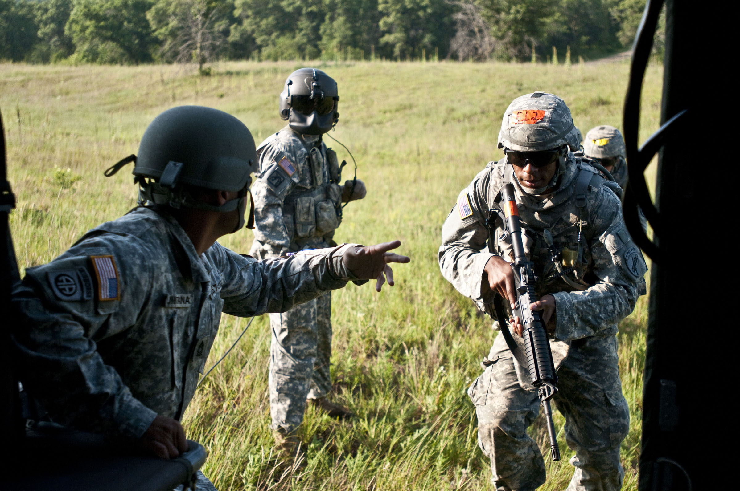  Spc. Joel E. Hughes, a civil affairs specialist from Pensacola, Fla., assigned to 350th Civil Affairs Command boards a UH-60 Blackhawk along with other competitiors for the 2010 Army Reserve Best Warrior Competition at Fort McCoy, Wis., July 29, 201