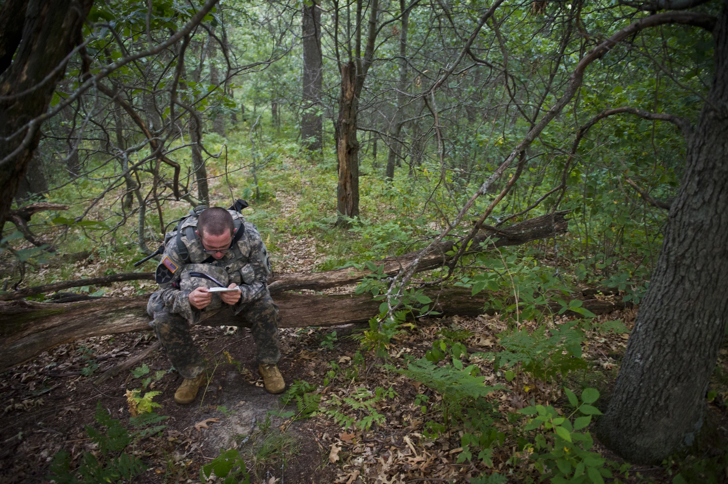  Spc. Michael Swan, a track vehicle repairer from Gurley, Ala., assigned to the 335th Signal Command,       at the night land navigation course during the 2012 U.S. Army Reserve Best Warrior Competition at Fort McCoy, Wis., July 17. The competitors s